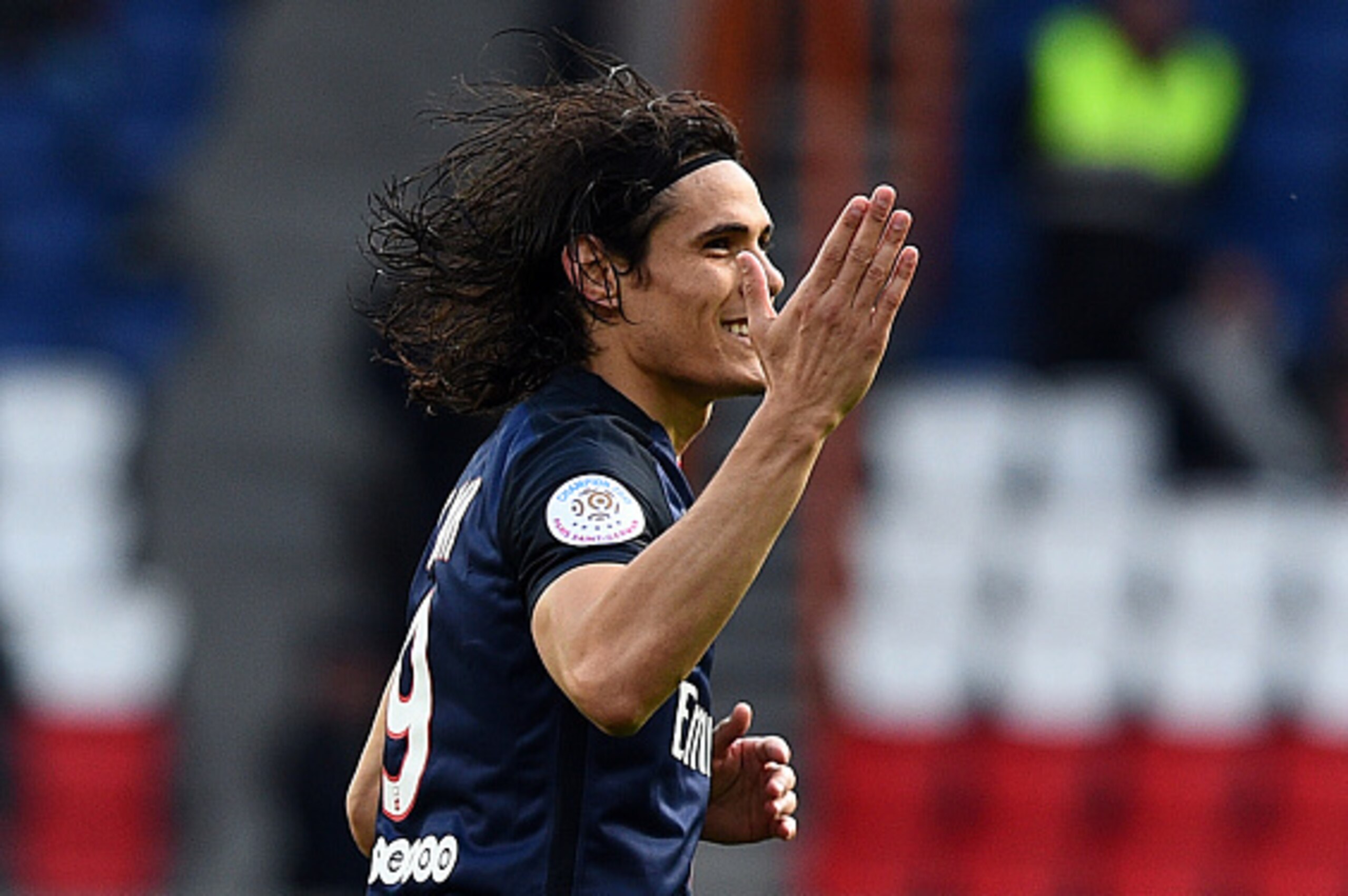 Paris Saint-Germain's Uruguyan forward Edinson Cavani celebrates after scoring a goal during the French L1 football match between Paris Saint-Germain and Caen at the Parc des Princes stadium in Paris on April 16, 2016.  / AFP / FRANCK FIFE        (Photo c