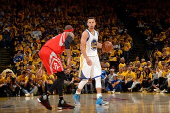OAKLAND, CA - APRIL 16: Stephen Curry #30 of the Golden State Warriors handles the ball during the game against the Houston Rockets in Game One of the Western Conference Quarterfinals during the 2016 NBA Playoffs April 16, 2016 at ORACLE Arena in Oakland,
