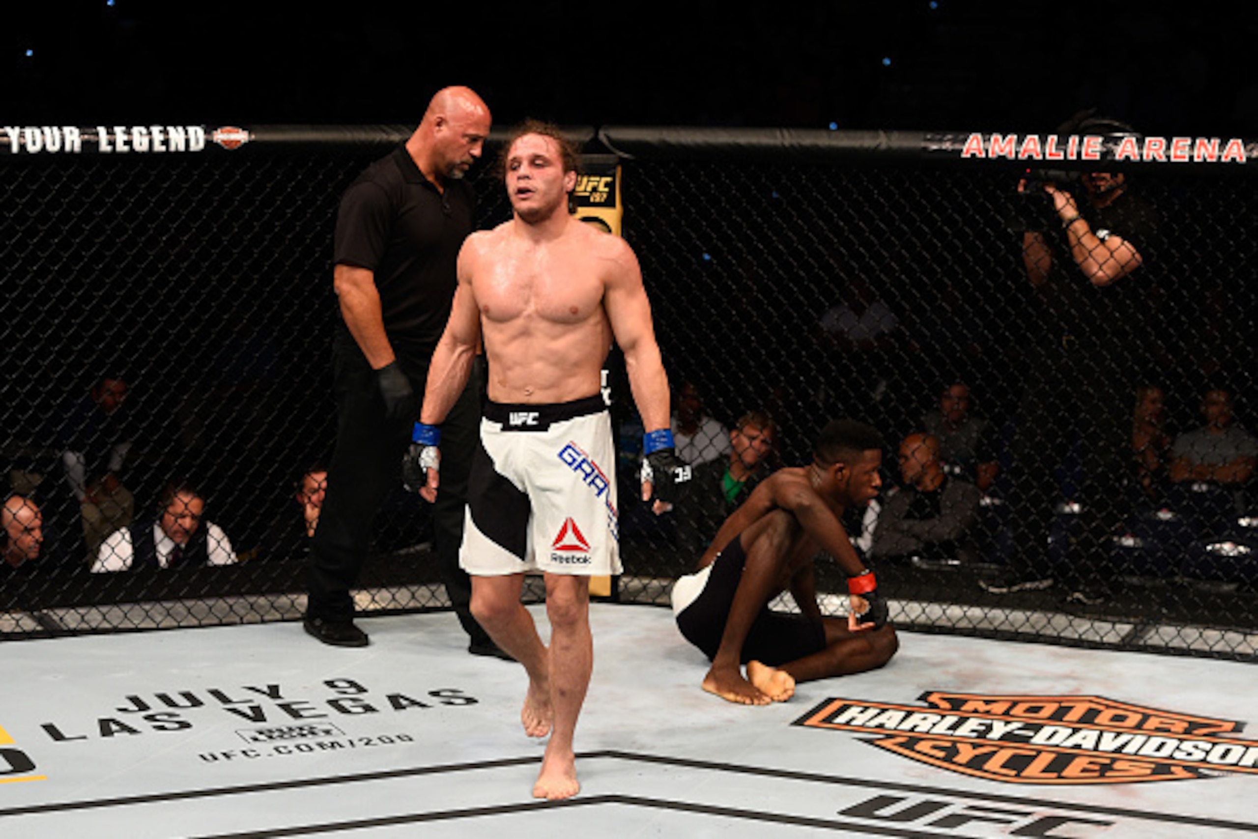 TAMPA, FL - APRIL 16:   (L-R) Michael Graves celebrates his submission victory over Randy Brown in their welterweight bout during the UFC Fight Night event at Amalie Arena on April 16, 2016 in Tampa, Florida. (Photo by Jeff Bottari/Zuffa LLC/Zuffa LLC via