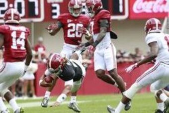 Apr 16, 2016; Tuscaloosa, AL, USA; Alabama Crimson Tide quarterback Jalen Hurts (2) dives for yardage during the annual A-day game at Bryant-Denny Stadium. Mandatory Credit: Marvin Gentry-USA TODAY Sports