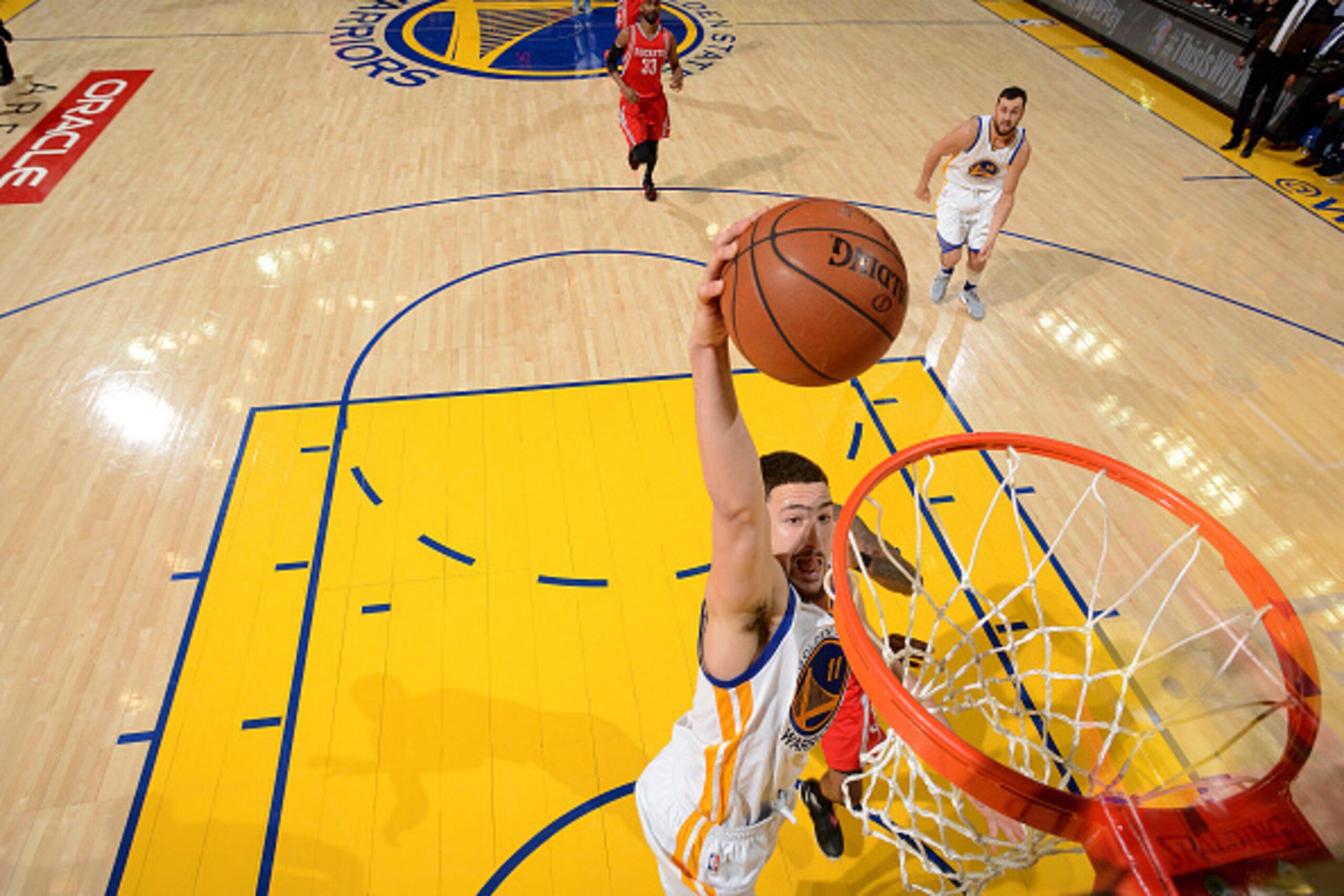 OAKLAND, CA - APRIL 16: Klay Thompson #11 of the Golden State Warriors goes for the dunk during the game against the Houston Rockets in Game One of the Western Conference Quarterfinals during the 2016 NBA Playoffs April 16, 2016 at ORACLE Arena in Oakland