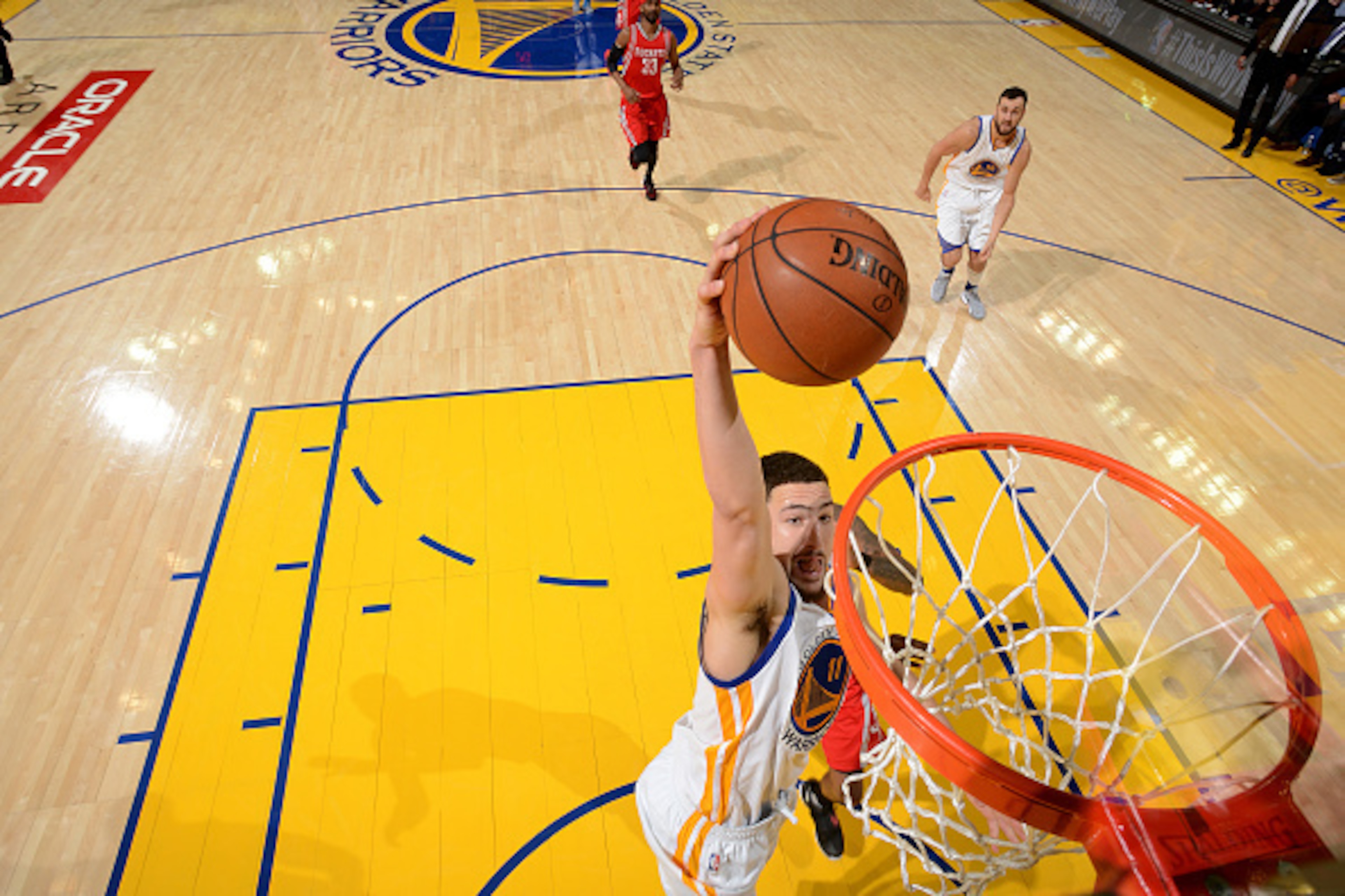 OAKLAND, CA - APRIL 16: Klay Thompson #11 of the Golden State Warriors goes for the dunk during the game against the Houston Rockets in Game One of the Western Conference Quarterfinals during the 2016 NBA Playoffs April 16, 2016 at ORACLE Arena in Oakland