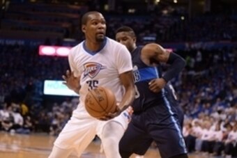 Apr 16, 2016; Oklahoma City, OK, USA; Oklahoma City Thunder forward Kevin Durant (35) drives to the basket defended by Dallas Mavericks forward Charlie Villanueva (3) during the third quarter in game one of their first round NBA Playoffs series at Chesape