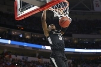 Mar 19, 2016; Raleigh, NC, USA; Providence Friars guard Kris Dunn (3) dunks the ball against the North Carolina Tar Heels in the second half during the second round of the 2016 NCAA Tournament at PNC Arena. Mandatory Credit: Geoff Burke-USA TODAY Sports