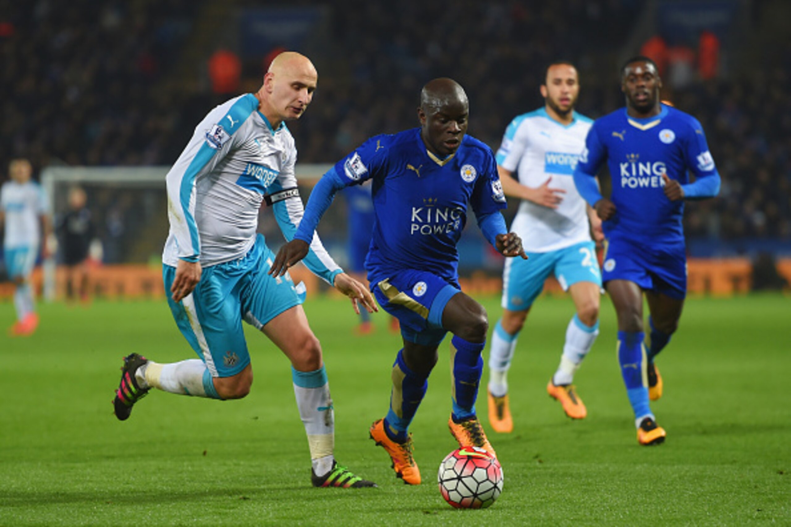 LEICESTER, ENGLAND - MARCH 14:  Ngolo Kante of Leicester City is chased by Jonjo Shelvey of Newcastle United during the Barclays Premier League match between Leicester City and Newcastle United at The King Power Stadium on March 14, 2016 in Leicester, Eng