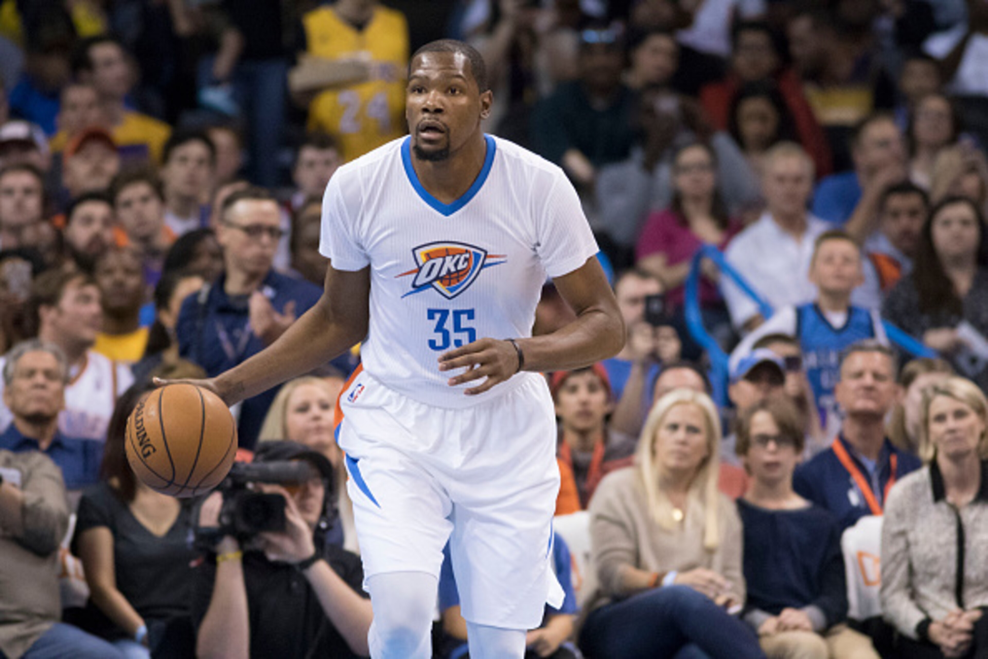 OKLAHOMA CITY, OK - APRIL 11: Kevin Durant #35 of the Oklahoma City Thunder brings the ball down court against the Los Angeles Lakers during a NBA game at the Chesapeake Energy Arena on April 11, 2016 in Oklahoma City, Oklahoma. NOTE TO USER: User express