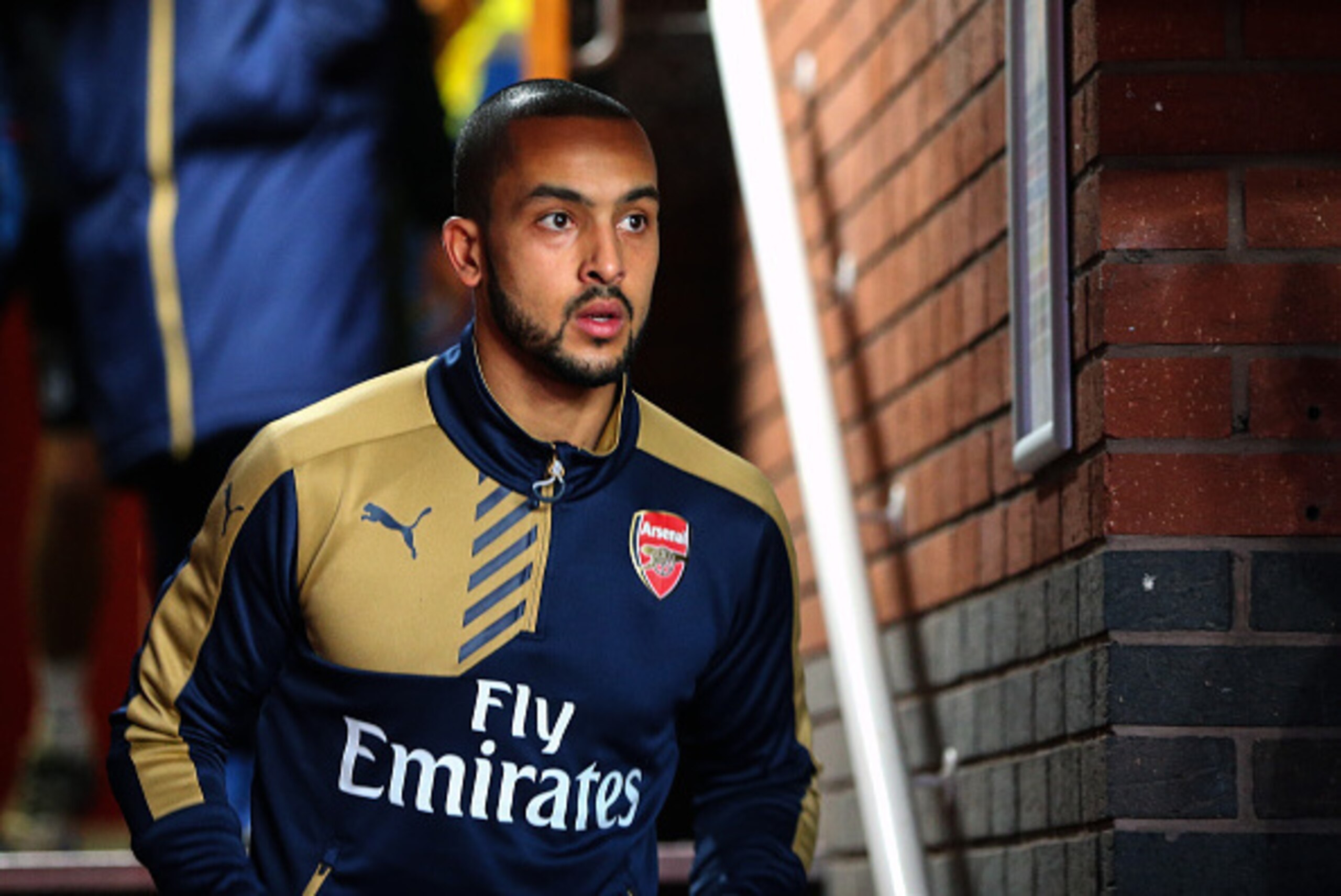 STOKE-ON-TRENT, ENGLAND - JANUARY 17: Theo Walcott of Arsenal come out to warm up before the Barclays Premier League match between Stoke City and Arsenal at the Britannia Stadium on January 17, 2016 in Stoke-on-Trent, England. (Photo by Catherine Ivill - 