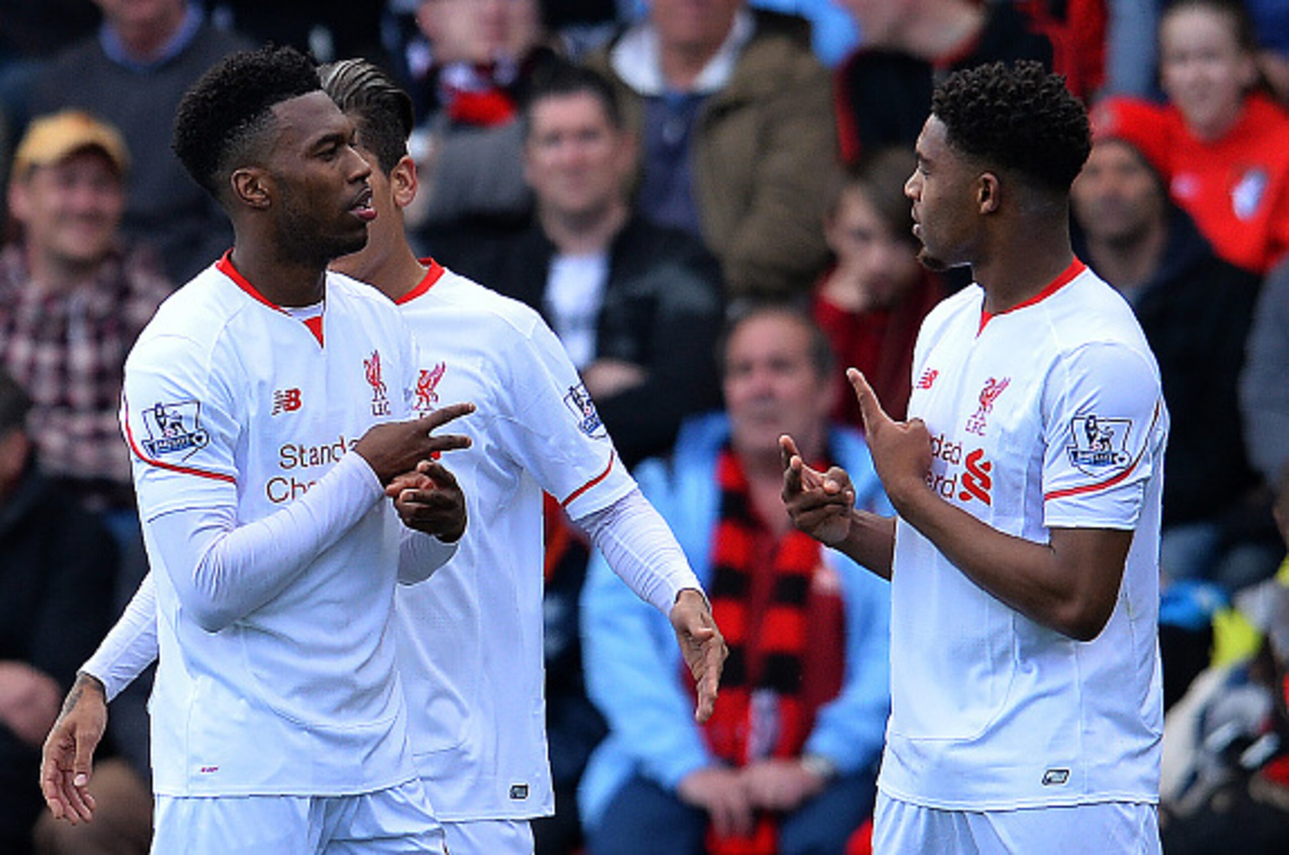 Liverpool's English striker Daniel Sturridge (L) celebrates scoring his team's second goal with Liverpool's English midfielder Jordon Ibe during the English Premier League football match between Bournemouth and Liverpool at the Vitality Stadium in Bournem