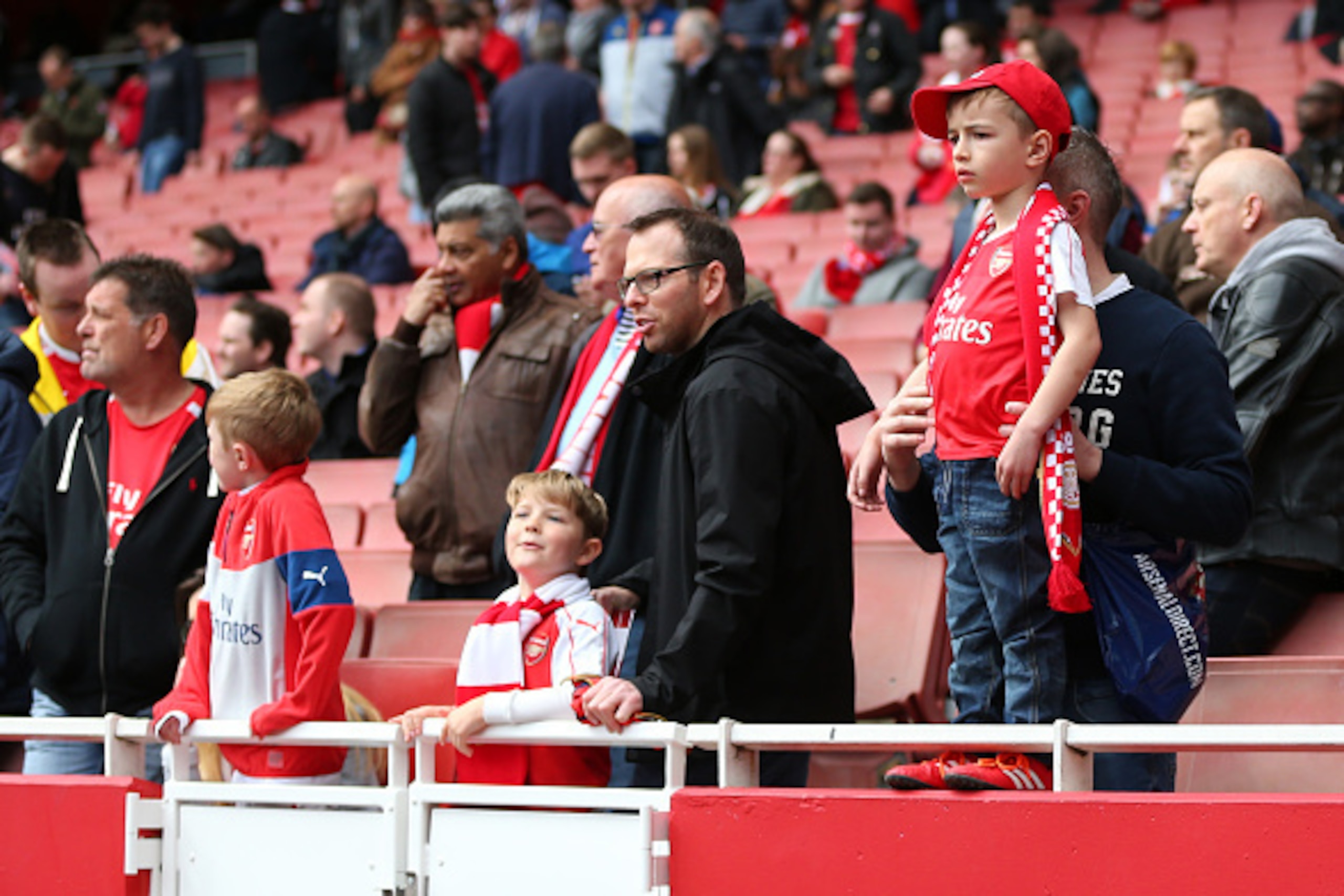 LONDON, ENGLAND - APRIL 17 :  A young Arsenal fan looks on before the Barclays Premier League match between Arsenal and Crystal Palace at the Emirates Stadium on April 17, 2016 in London, England.  (Photo by Catherine Ivill - AMA/Getty Images)