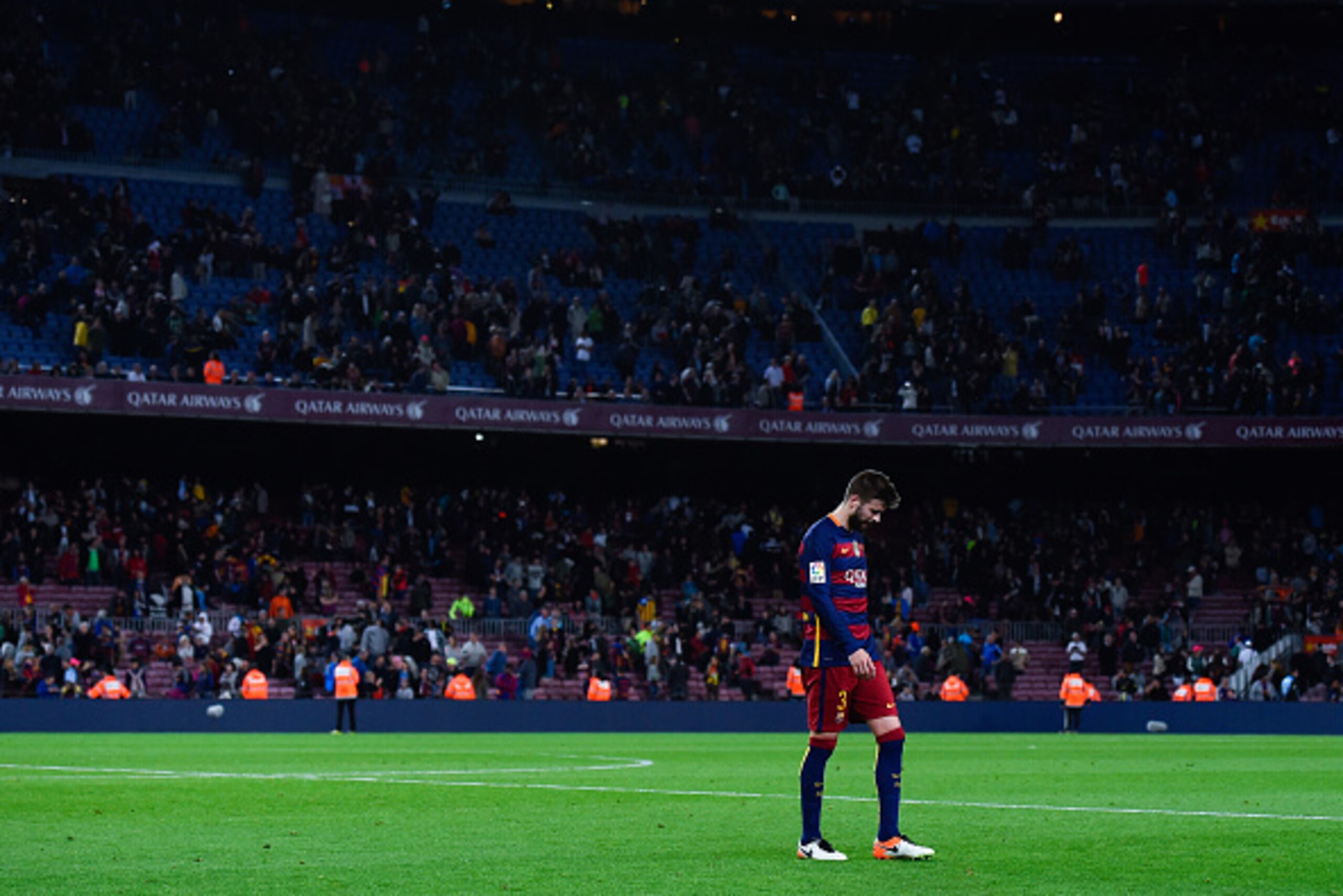 BARCELONA, SPAIN - APRIL 17:  Gerard Pique of FC Barcelona leaves the pithc dejected at the end of the La Liga match between FC Barcelona and Valencia CF at Camp Nou on April 17, 2016 in Barcelona, Spain.  (Photo by David Ramos/Getty Images)