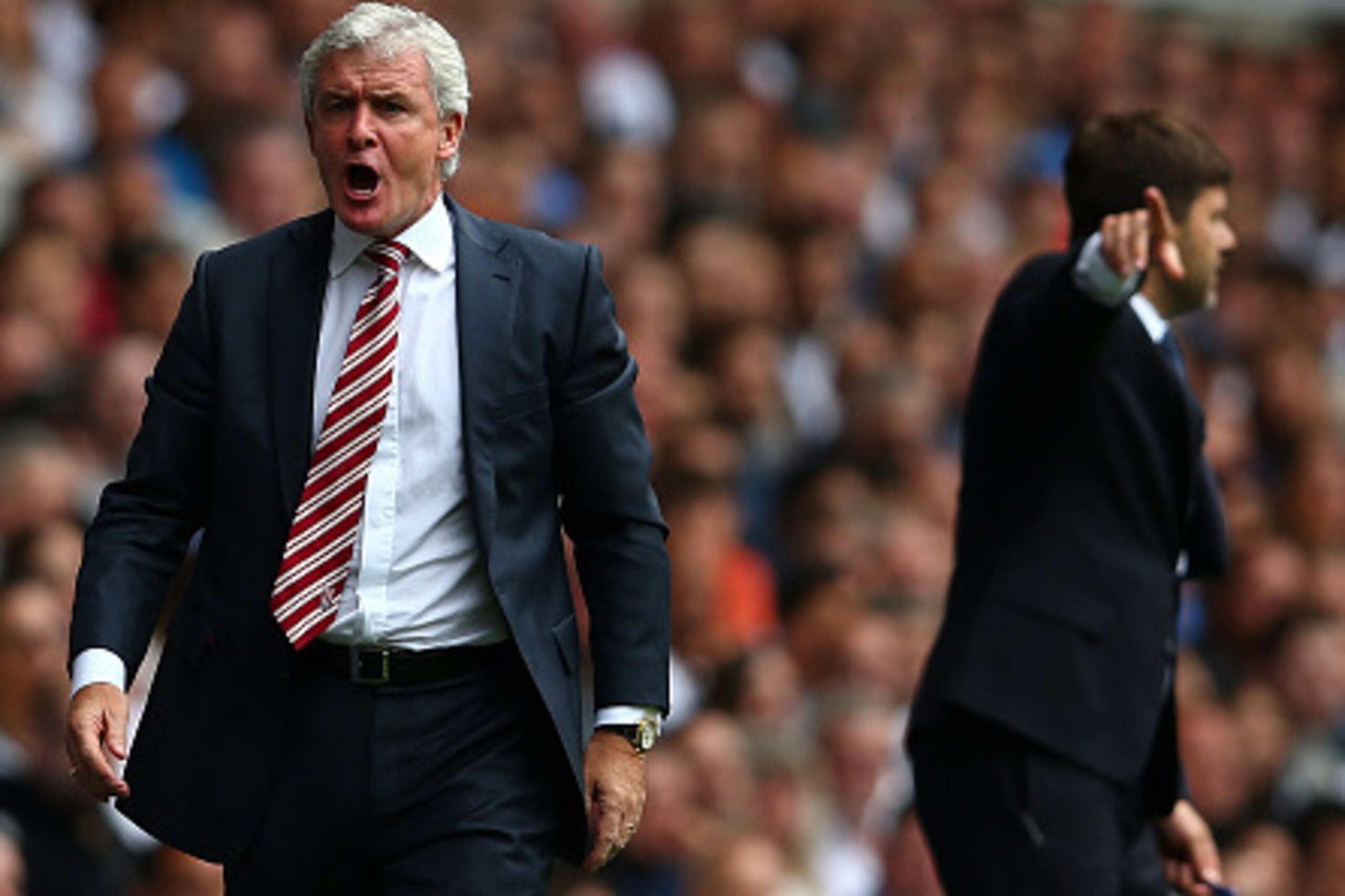 LONDON, ENGLAND - AUGUST 15: Mark Hughes, Manager of Stoke City reacts during the Barclays Premier League match between Tottenham Hotspur and Stoke City on August 15, 2015 in London, United Kingdom. (Photo by Dan Mullan/Getty Images) LONDON, ENGLAND - AUGUST 15: Mark Hughes, Manager of Stoke City reacts during the Barclays Premier League match between Tottenham Hotspur and Stoke City on August 15, 2015 in London, United Kingdom. (Photo by Dan Mullan/Getty Images)