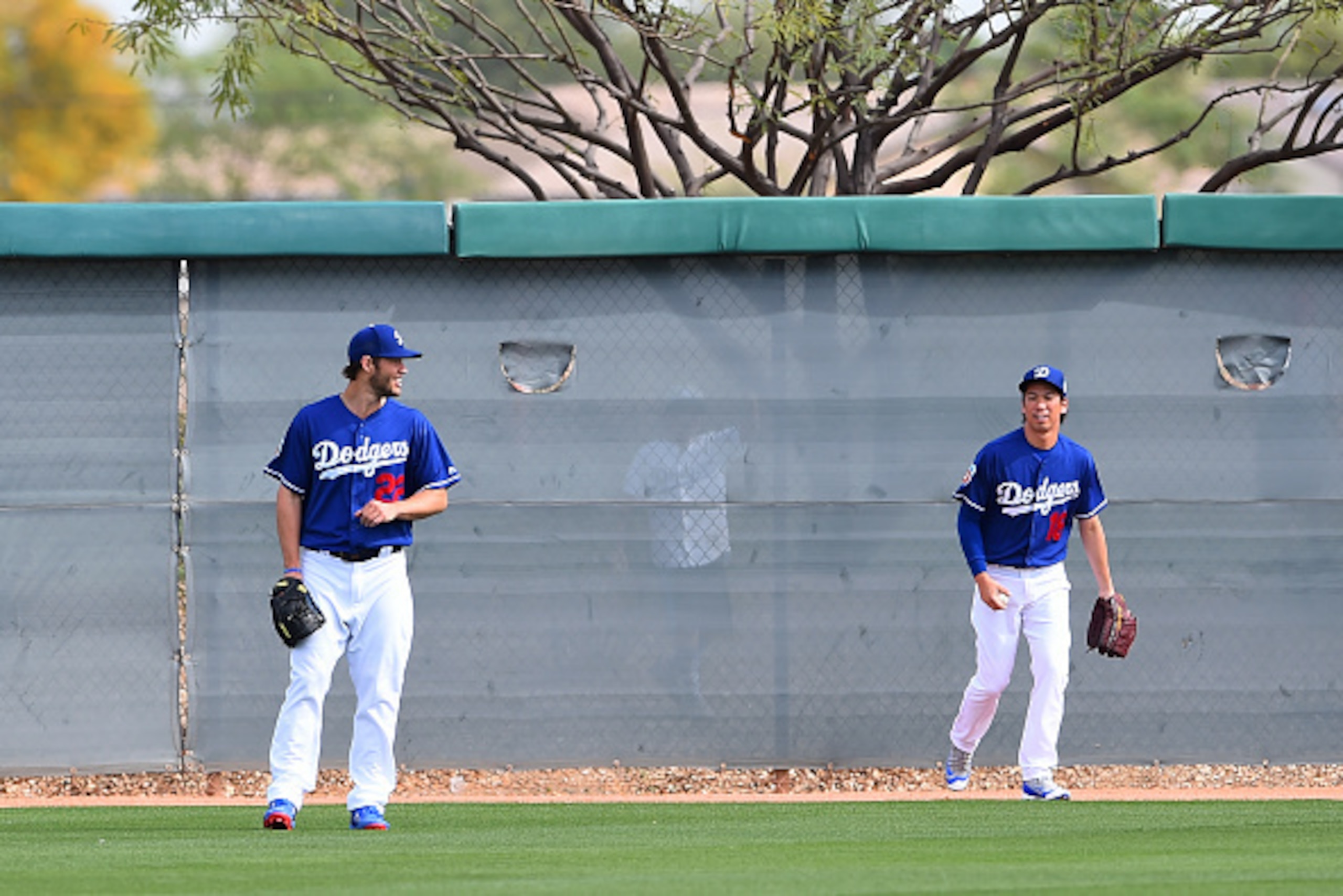 GLENDALE, AZ - MARCH 07: Kenta Maeda #18 and Clayton Kershaw #22 of Los Angels Dodgers looks on during a spring training workout on March 7, 2016 in Glendale, ,Arizona. (Photo by Masterpress/Getty Images) GLENDALE, AZ - MARCH 07: Kenta Maeda #18 and Clayton Kershaw #22 of Los Angels Dodgers looks on during a spring training workout on March 7, 2016 in Glendale, ,Arizona. (Photo by Masterpress/Getty Images)
