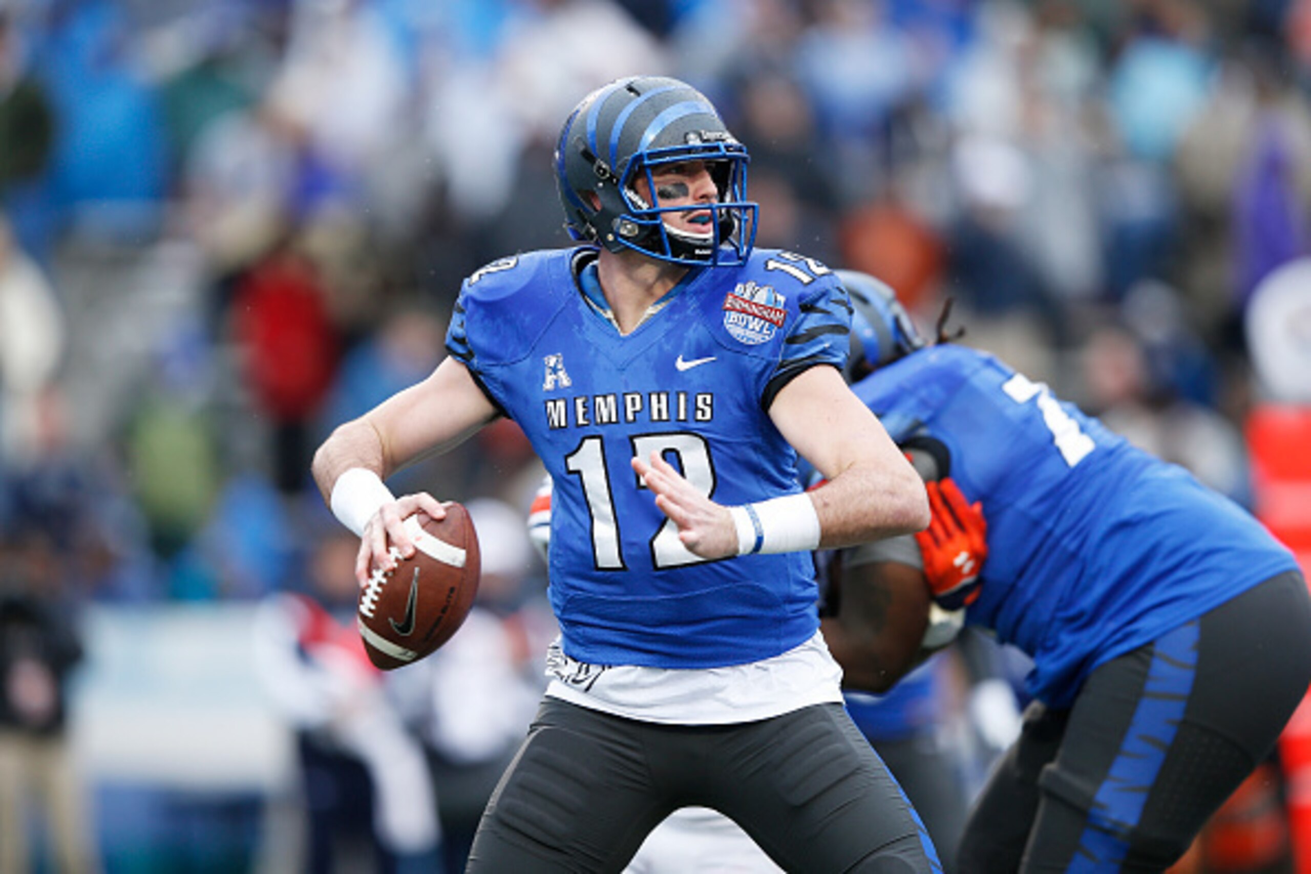 BIRMINGHAM, AL - DECEMBER 30: Paxton Lynch #12 of the Memphis Tigers looks to pass against the Auburn Tigers during the Birmingham Bowl at Legion Field on December 30, 2015 in Birmingham, Alabama. Auburn defeated Memphis 31-10. (Photo by Joe Robbins/Getty