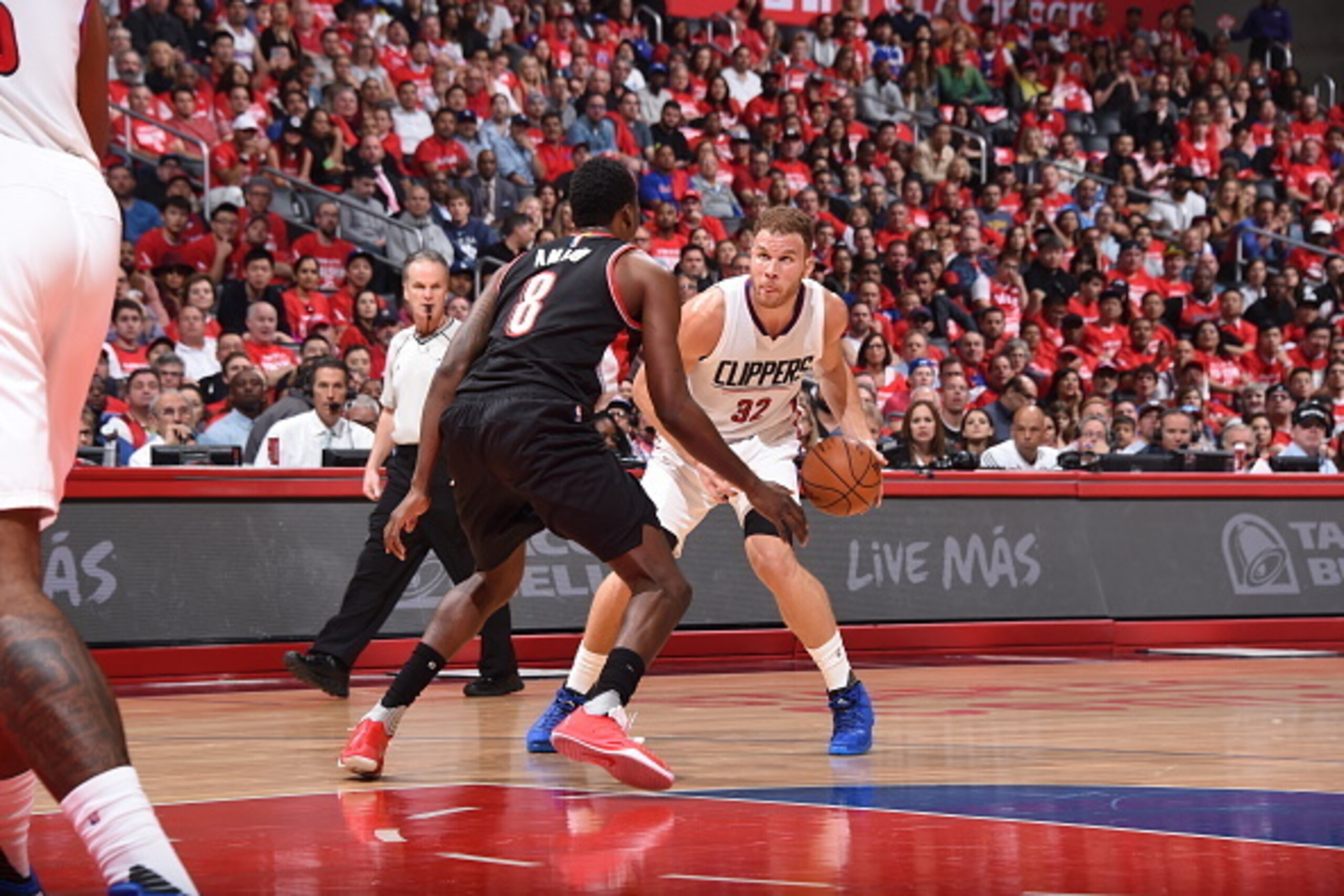 LOS ANGELES, CA - APRIL 17:  Blake Griffin #32 of the Los Angeles Clippers handles the ball against Al-Farouq Aminu #8 of the Portland Trail Blazers in Game One of the Western Conference Quarterfinals during the 2016 NBA Playoffs on April 17, 2016 at STAP
