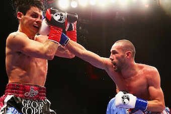 MASHANTUCKET, CT - APRIL 16:  Jose Pedraza lands a right at Stephen Smith during their IBF World Junior Lightweight Championship bout at Foxwoods Resort Casino on April 16, 2016 in Mashantucket, Connecticut.  (Photo by Maddie Meyer/Getty Images)