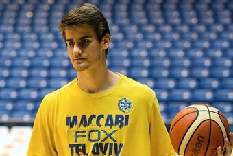 Dragan Bender, a professional Croatian basketball player currently playing for Maccabi Tel Aviv in the Israeli Basketball Super League attends a training session at the Menora Mivtachim Arena in Tel Aviv on March 16, 2016.
Bender's name is not yet well kn