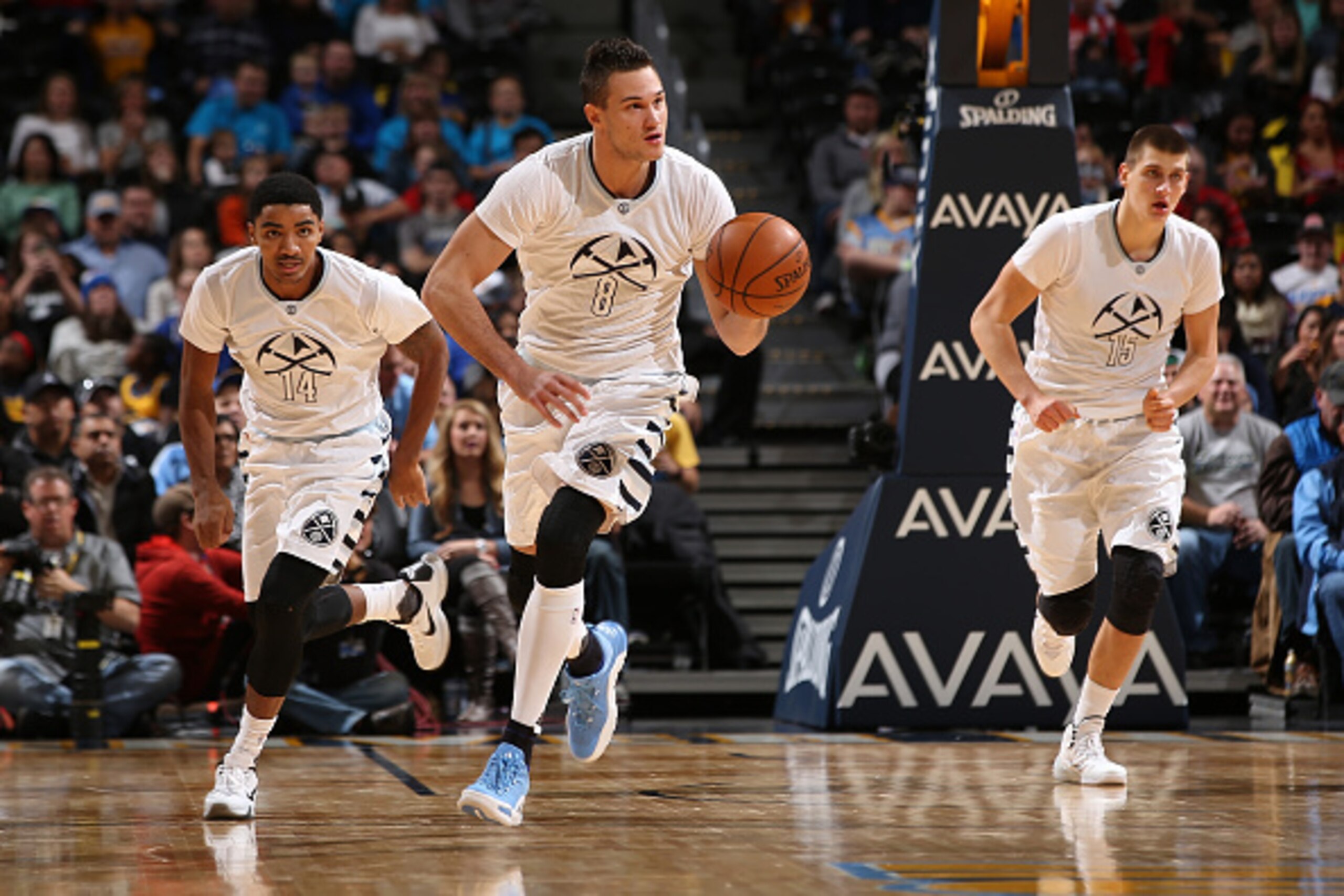 DENVER, CO - NOVEMBER 24:  Danilo Gallinari #8 of the Denver Nuggets controls the ball as he leads his teammates Gary Harris #14 and Nikola Jokic #15 of the Denver Nuggets up court against the Los Angeles Clippers at Pepsi Center on November 24, 2015 in D