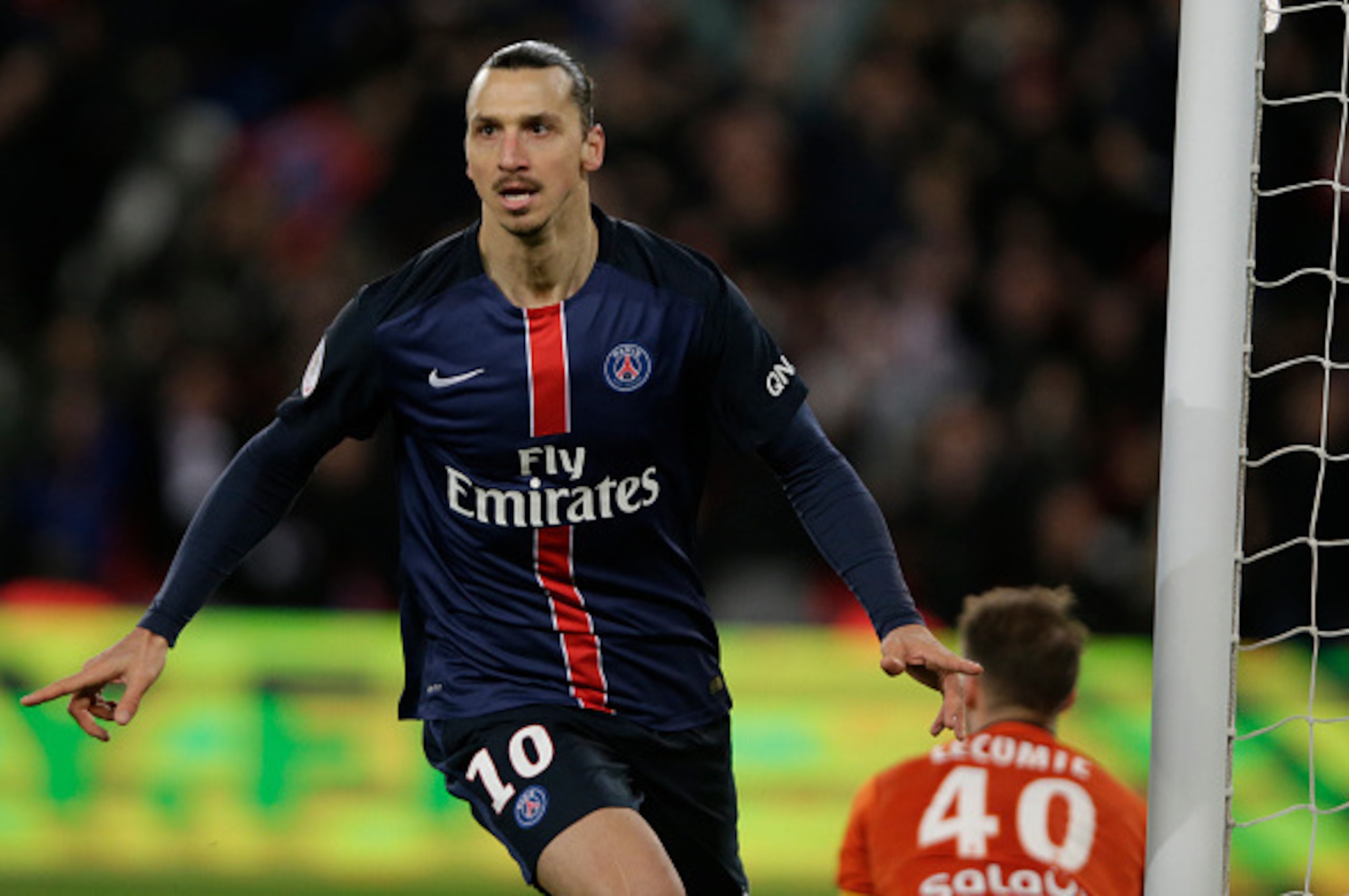 Paris Saint-Germain's Swedish forward Zlatan Ibrahimovic celebrates after scoring a goal during the French L1 football match between Paris Saint-Germain (PSG) vs FC Lorient on February 03, 2016 at the Parc des Princes stadium in Paris. / AFP / KENZO TRIBO