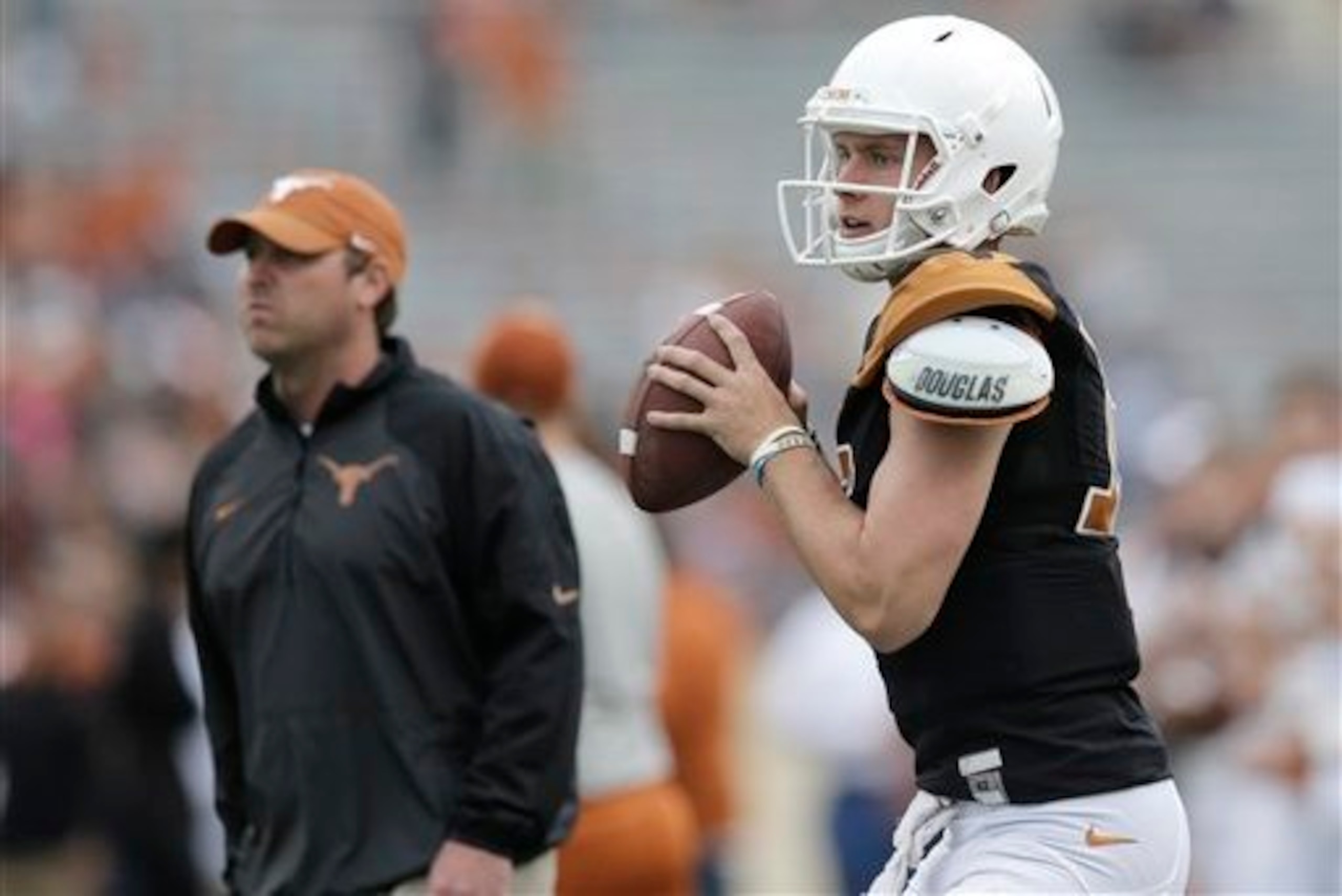 Texas OC Sterlin Gilbert and QB Shane Buechele