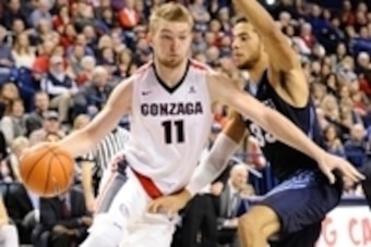 Jan 16, 2016; Spokane, WA, USA; Gonzaga Bulldogs forward Domantas Sabonis (11) goes up against San Diego Toreros center Jito Kok (33) during the second half at McCarthey Athletic Center. The Bulldogs won 88-52. Mandatory Credit: James Snook-USA TODAY Spor