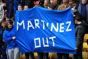 WATFORD, UNITED KINGDOM - APRIL 09:  Everton supporters hold a banner against Roberto Martinez Manager of Everton prior to the Barclays Premier League match between Watford and Everton at Vicarage Road on April 9, 2016 in Watford, England.  (Photo by Step