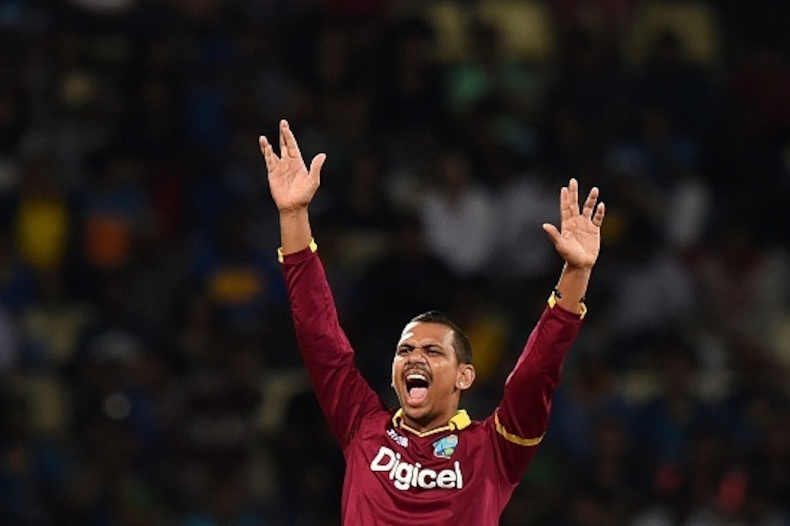 West Indies cricketer Sunil Narine successfully appeals for a Leg Before Wicket (LBW) decision against Sri Lankan cricketer Tillakaratne Dilshan during the first Twenty20 International cricket match between Sri Lanka and the West Indies at the Pallekele I