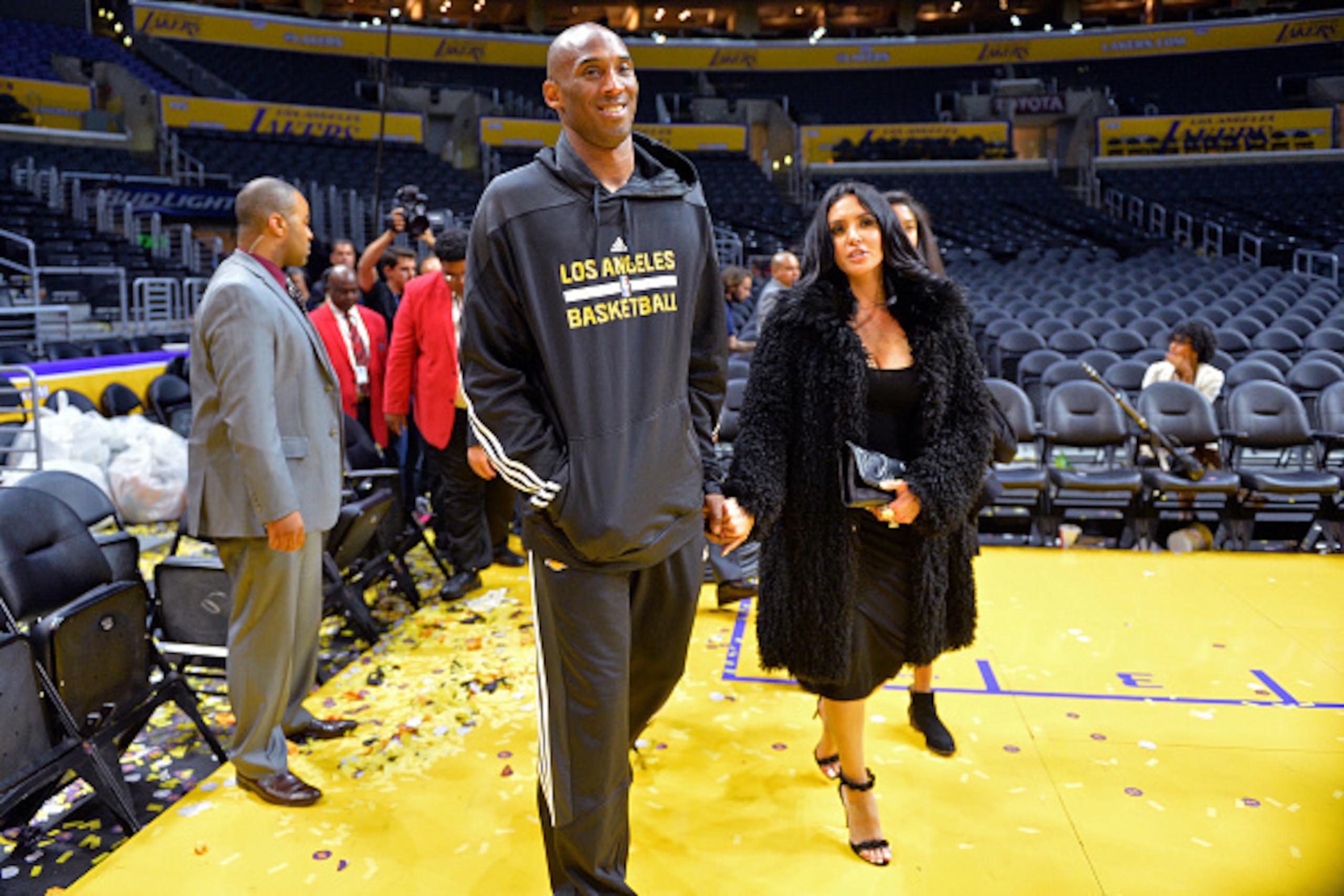 LOS ANGELES, CA - APRIL 13:  Kobe Bryant #24 of the Los Angeles Lakers and his wife Vanessa Bryant walk onto the court after the game against the Utah Jazz on April 13, 2016 at Staples Center in Los Angeles, California. NOTE TO USER: User expressly acknow