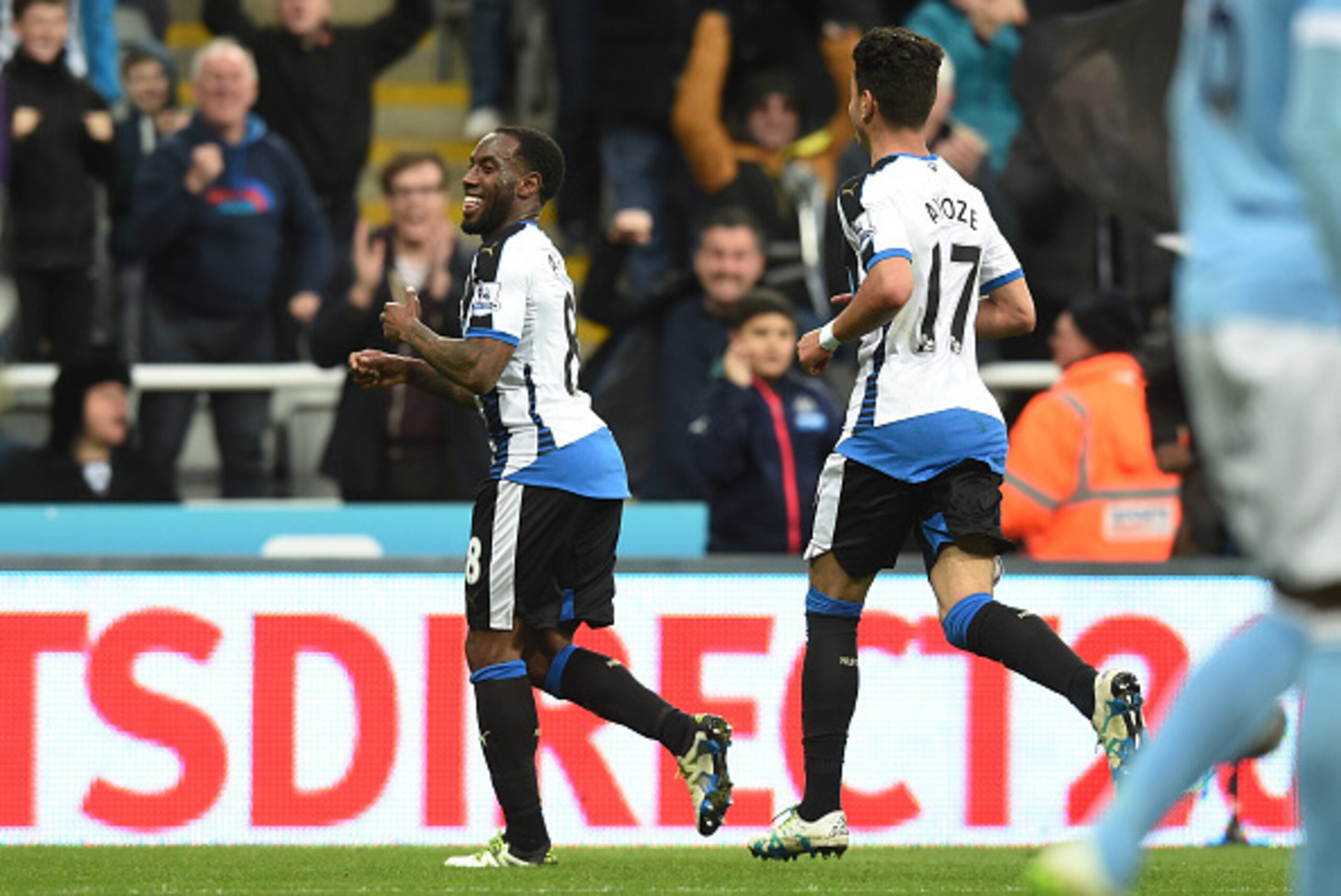 NEWCASTLE UPON TYNE, ENGLAND - APRIL 19:  Vurnon Anita (L) of Newcastle United celebrates after scoring a goal to level the scores at 1-1  during the Barclays Premier League match between Newcastle United and Manchester City at St James' Park on April 19,