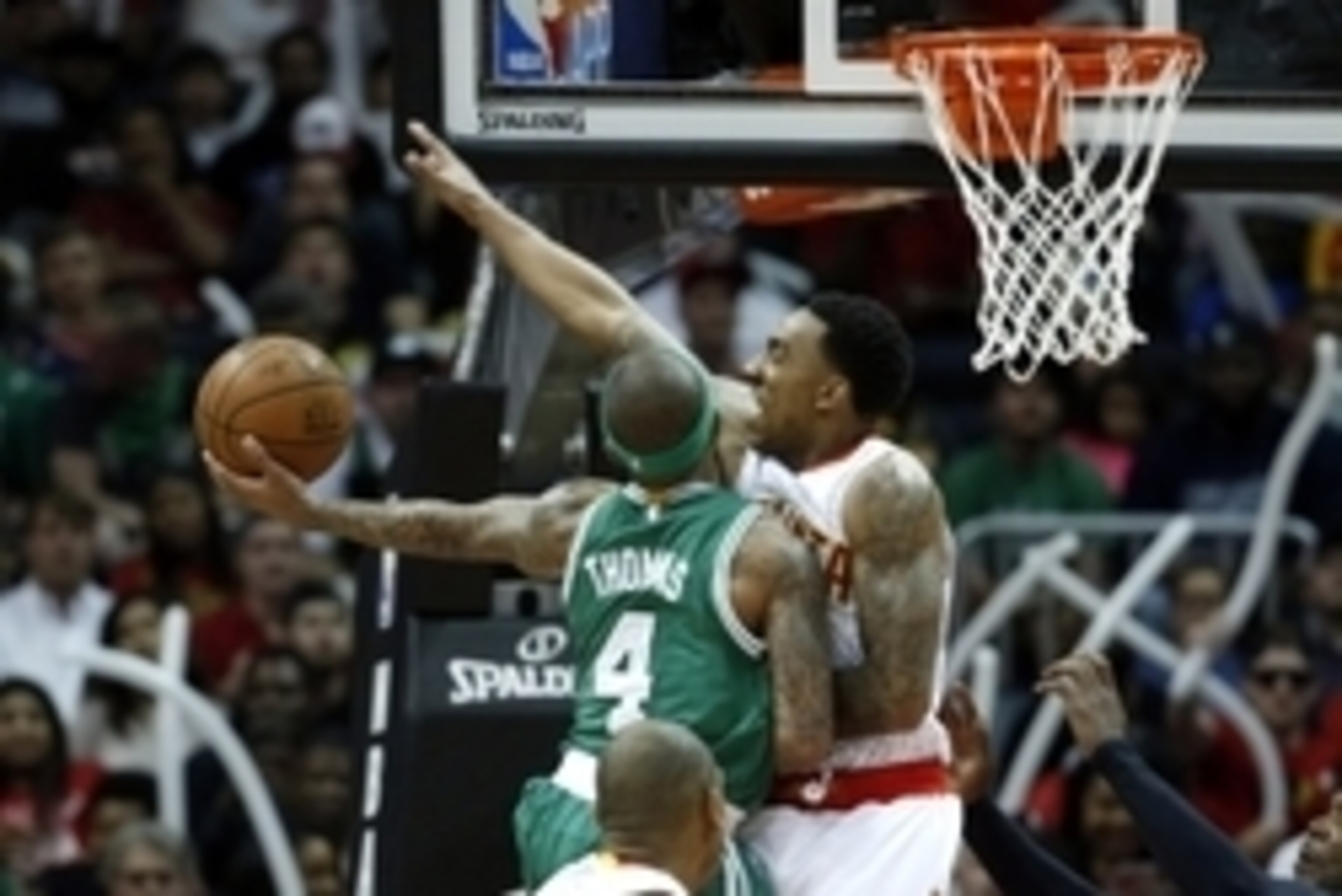 Apr 19, 2016; Atlanta, GA, USA; Boston Celtics guard Isaiah Thomas (4) attempts a shot against Atlanta Hawks guard Jeff Teague (0) in the third quarter of game two of the first round of the NBA Playoffs at Philips Arena. Mandatory Credit: Jason Getz-USA T Apr 19, 2016; Atlanta, GA, USA; Boston Celtics guard Isaiah Thomas (4) attempts a shot against Atlanta Hawks guard Jeff Teague (0) in the third quarter of game two of the first round of the NBA Playoffs at Philips Arena. Mandatory Credit: Jason Getz-USA T