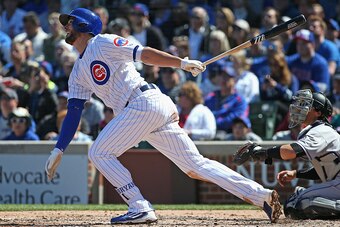 CHICAGO, IL - APRIL 15:  Kris Bryant of the Chicago Cubs bats against the Colorado Rockies at Wrigley Field on April 15, 2016 in Chicago, Illinois. All players are wearing #42 in honor of Jackie Robinson Day. The Rockies defeated the Cubs 6-1.  (Photo by 
