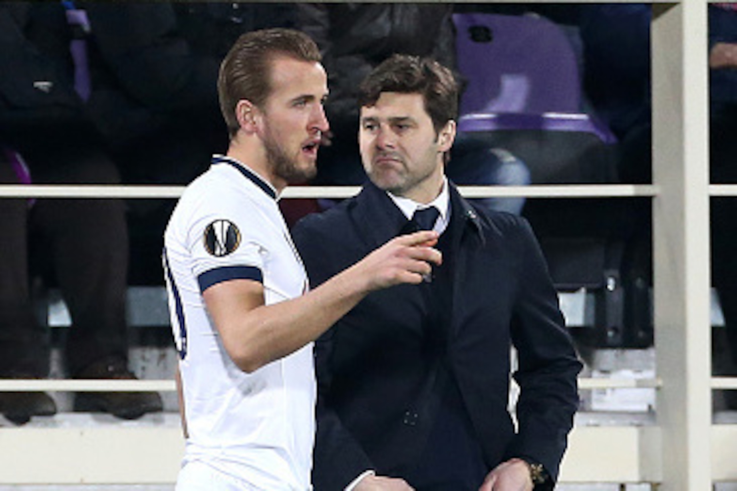 FLORENCE - FEBRUARY 18: Coach of Tottenham Mauricio Pochettino gives his instructions to Harry Kane before he enters the field during the UEFA Europa League round of 32 first leg match between Fiorentina and Tottenham Hotspur at Stadio Artemio Franchi on 