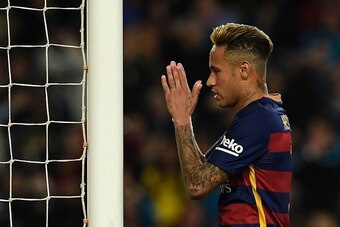 Barcelona's Brazilian forward Neymar gestures during the Spanish league football match FC Barcelona vs Valencia CF at the Camp Nou stadium in Barcelona on April 17, 2016. / AFP / LLUIS GENE        (Photo credit should read LLUIS GENE/AFP/Getty Images)