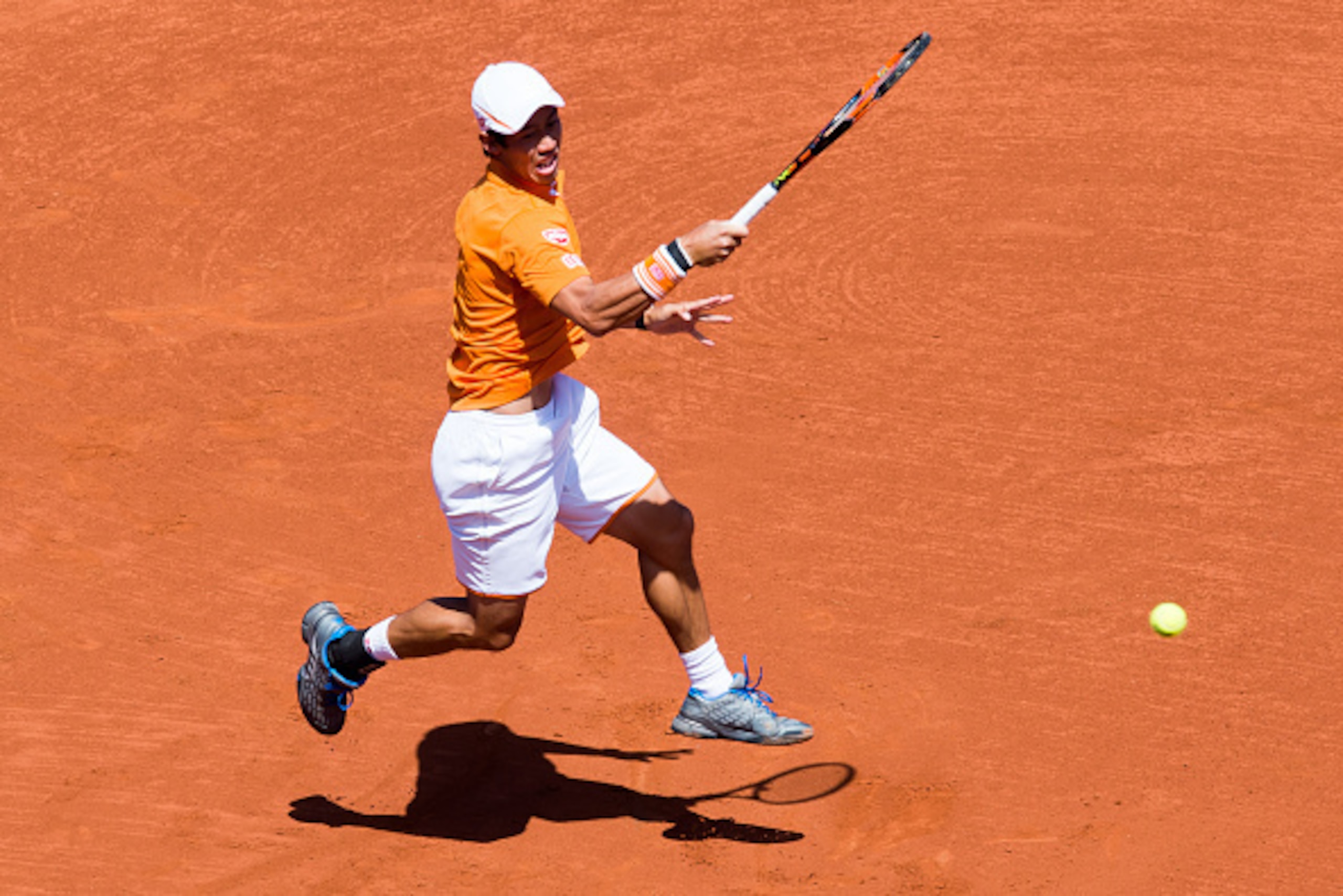 BARCELONA, SPAIN - APRIL 20: Kei Nishikori plays a forehand against Thiemo De Bakker during day three of the Barcelona Open Banc Sabadell at the Real Club de Tenis Barcelona on April 20, 2016 in Barcelona, Spain. (Photo by Alex Caparros/Getty Images) BARCELONA, SPAIN - APRIL 20: Kei Nishikori plays a forehand against Thiemo De Bakker during day three of the Barcelona Open Banc Sabadell at the Real Club de Tenis Barcelona on April 20, 2016 in Barcelona, Spain. (Photo by Alex Caparros/Getty Images)