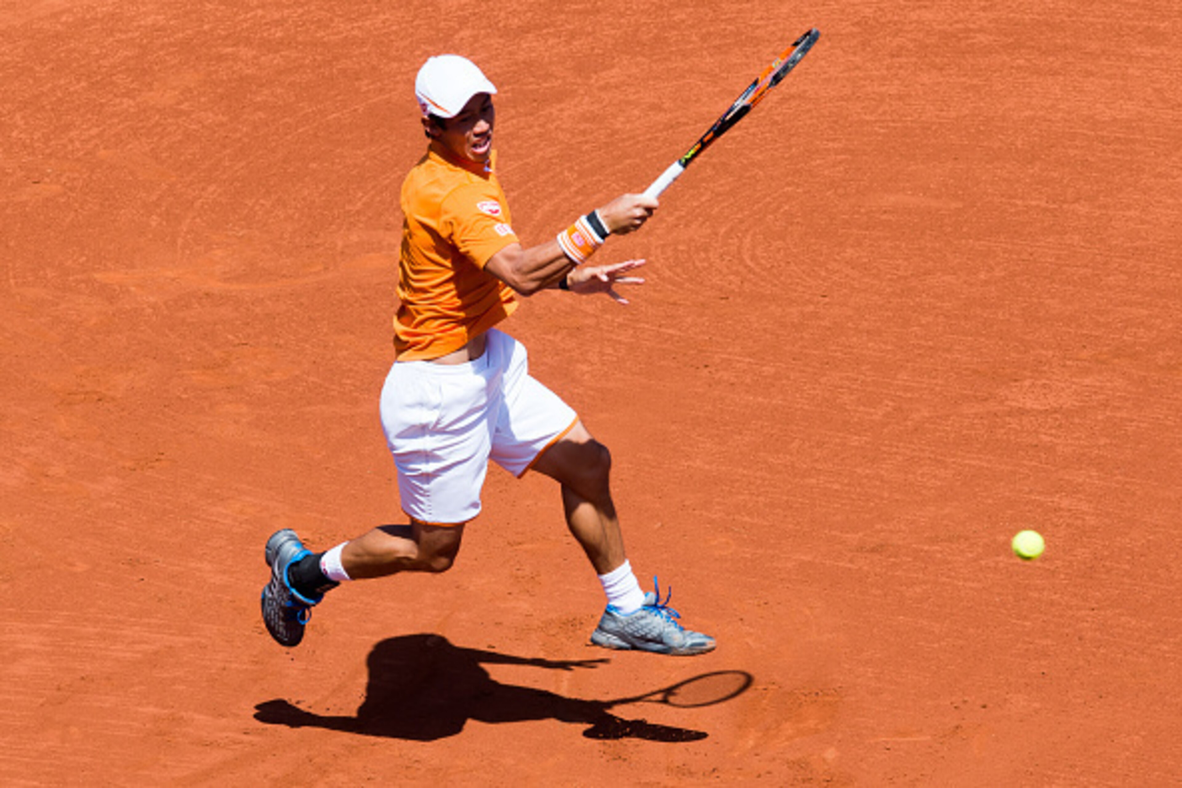 BARCELONA, SPAIN - APRIL 20:  Kei Nishikori plays a forehand against Thiemo De Bakker during day three of the Barcelona Open Banc Sabadell at the Real Club de Tenis Barcelona on April 20, 2016 in Barcelona, Spain.  (Photo by Alex Caparros/Getty Images)