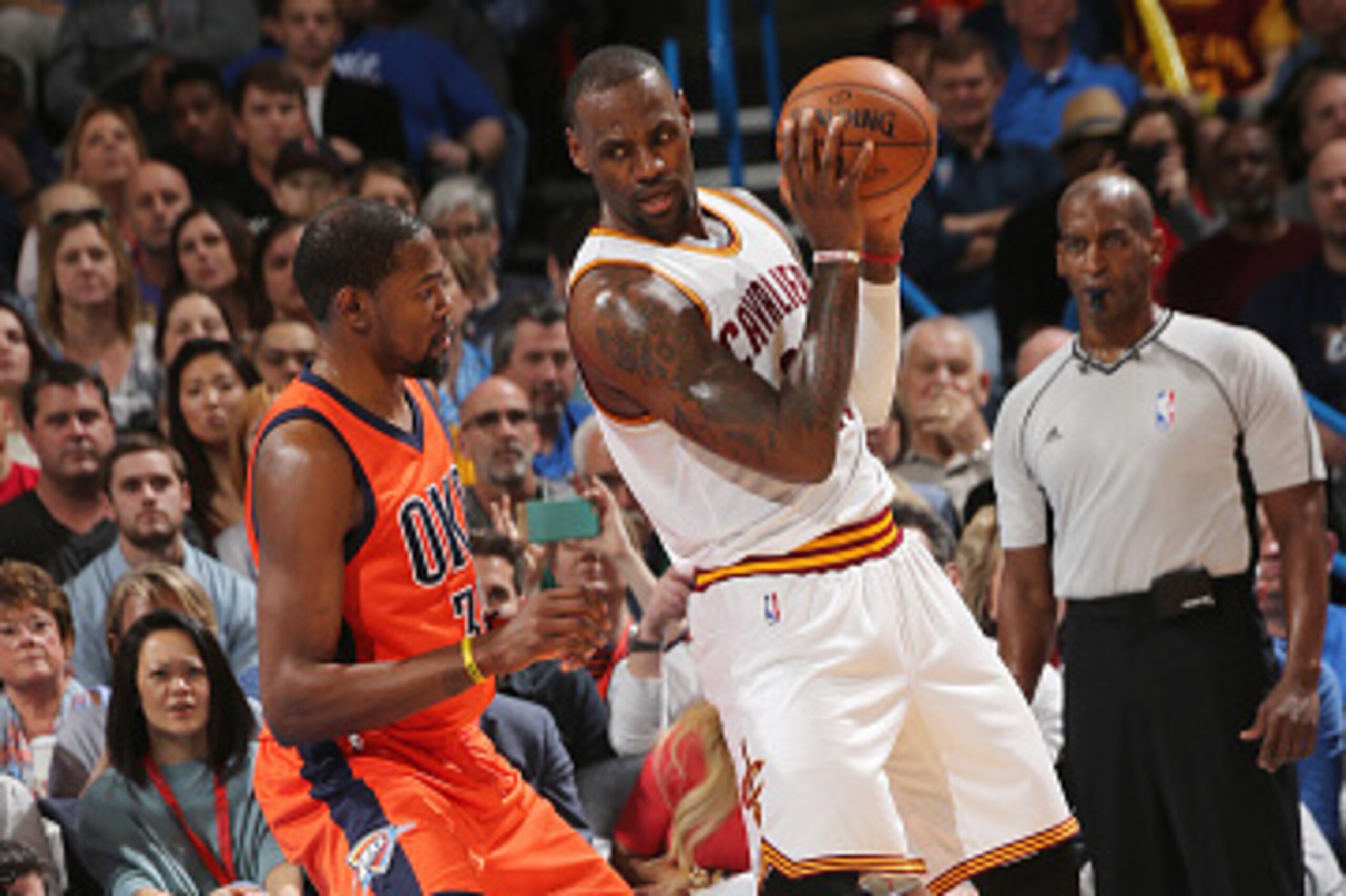 OKLAHOMA CITY, OK- FEBRUARY 21:  LeBron James #23 of the Cleveland Cavaliers posts up against Kevin Durant #35 of the Oklahoma City Thunder on February 21, 2016 at Chesapeake Energy Arena in Oklahoma City, Oklahoma. NOTE TO USER: User expressly acknowledg