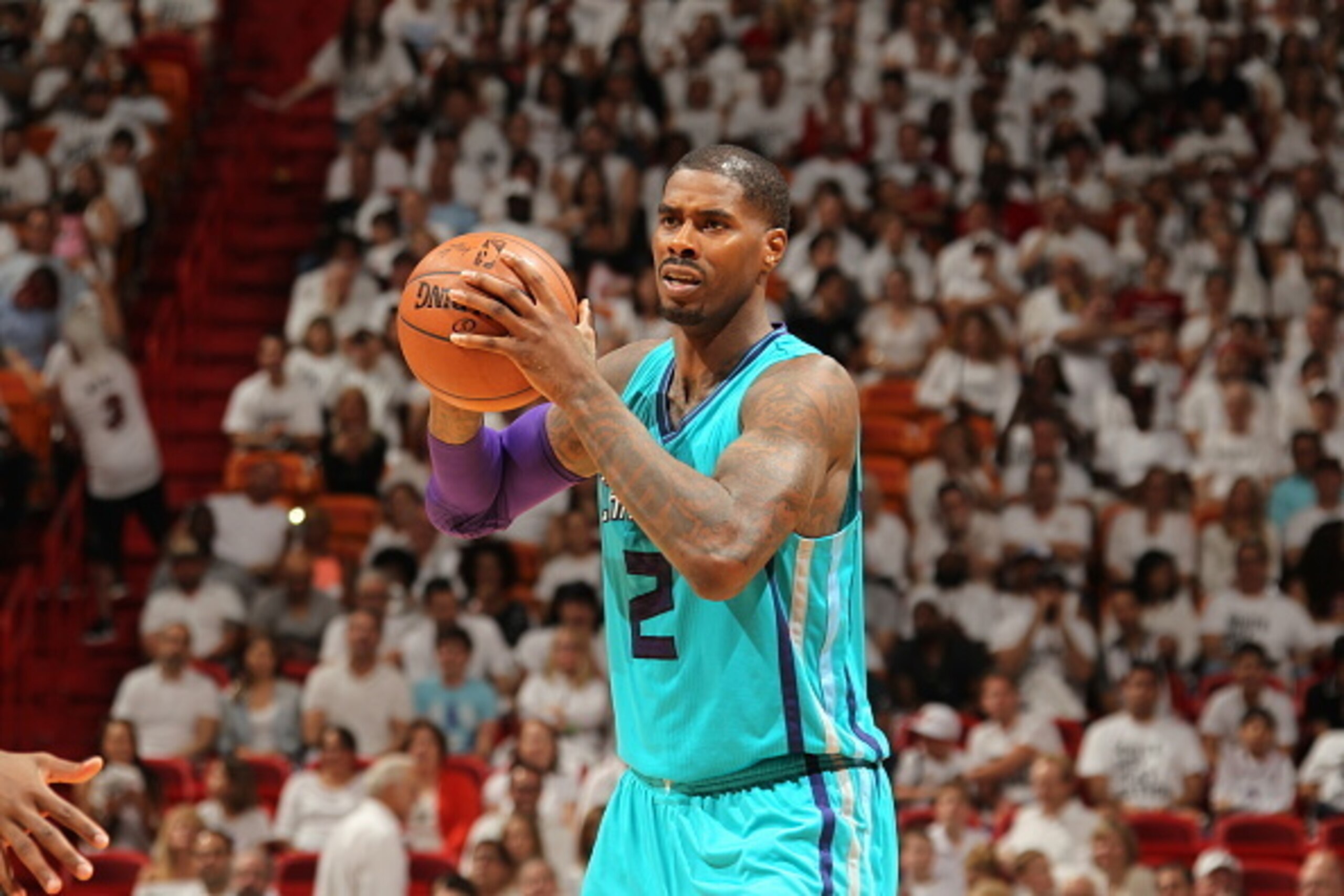 MIAMI, FL - APRIL 17: Marvin Williams #2 of the Charlotte Hornets defends the ball against the Miami Heat during Game One of the Eastern Conference Quarterfinals of the 2016 NBA Playoffs on April 17, 2016 at American Airlines Arena in Miami, Florida. NOT MIAMI, FL - APRIL 17: Marvin Williams #2 of the Charlotte Hornets defends the ball against the Miami Heat during Game One of the Eastern Conference Quarterfinals of the 2016 NBA Playoffs on April 17, 2016 at American Airlines Arena in Miami, Florida. NOT