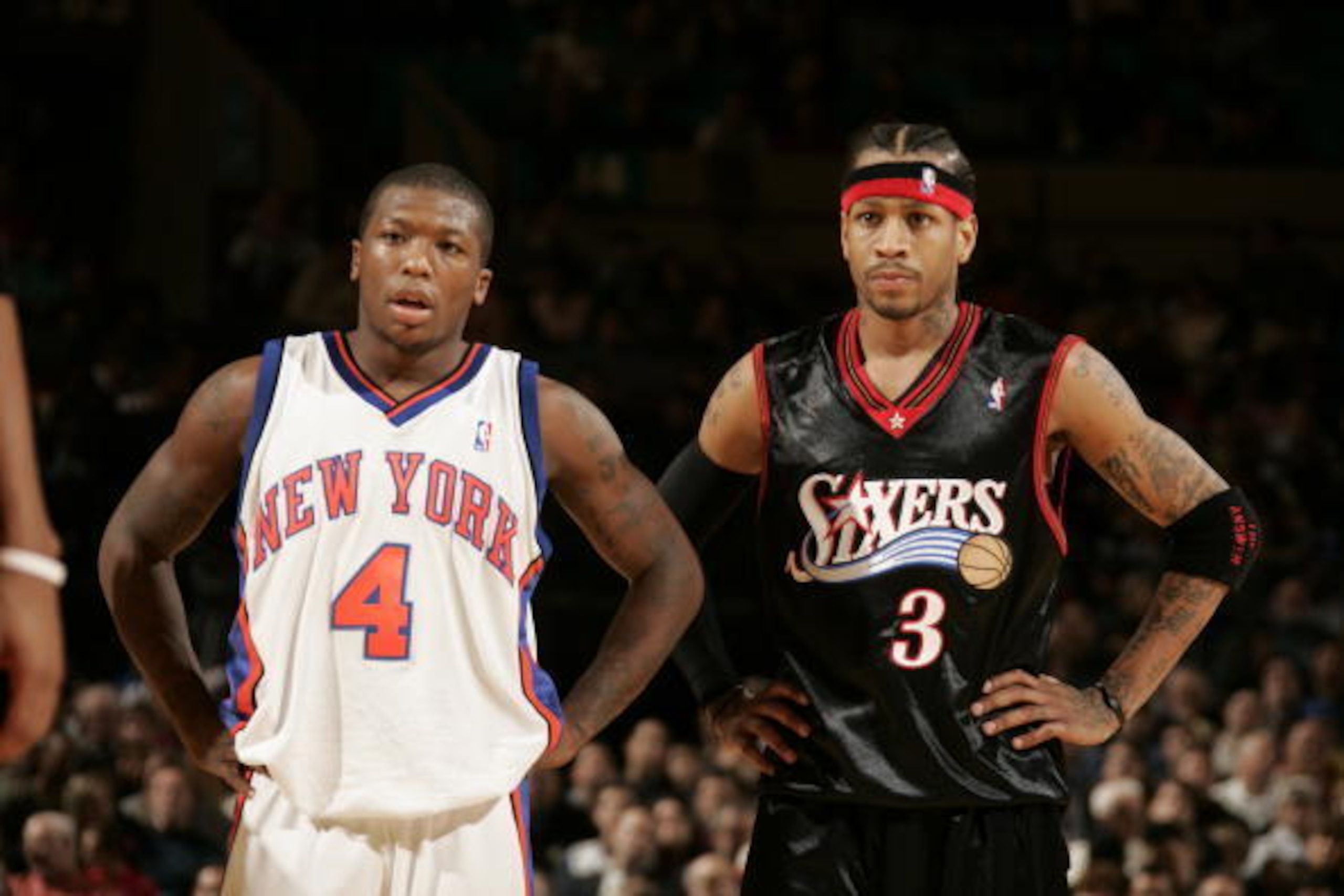 NEW YORK - NOVEMBER 26:  Allen Iverson #3 of the Philadelphia 76ers stands next to Nate Robinson #4 of the New York Knicks on November 26, 2005 at Madison Square Garden in New York City.  NOTE TO USER: User expressly acknowledges and agrees that, by downl