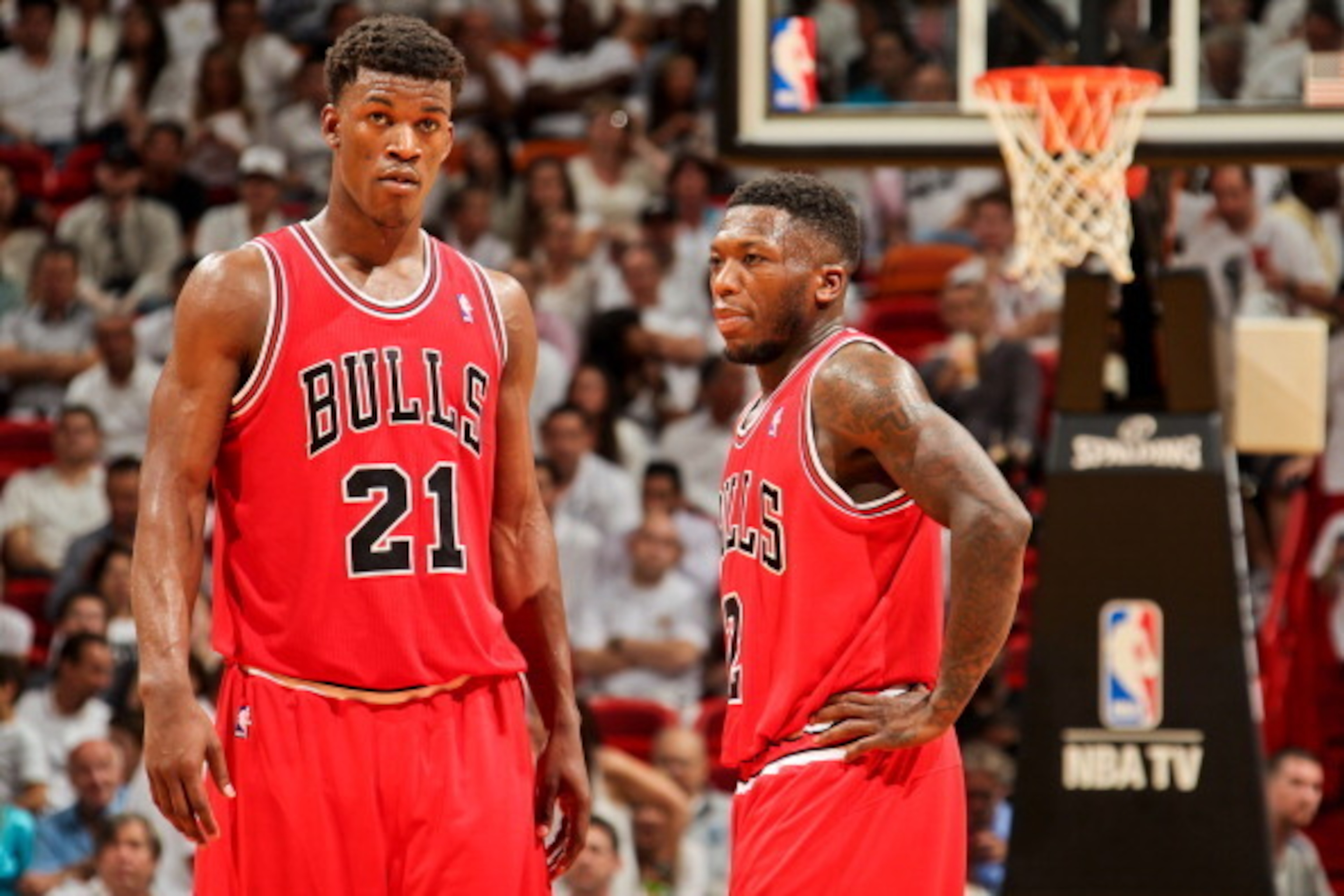 MIAMI, FL - MAY 6: Nate Robinson #2 and Jimmy Butler #21 of the Chicago Bulls speak while playing the Miami Heat in Game One of the Eastern Conference Semifinals during the 2013 NBA Playoffs on May 6, 2013 at American Airlines Arena in Miami, Florida. NOT MIAMI, FL - MAY 6: Nate Robinson #2 and Jimmy Butler #21 of the Chicago Bulls speak while playing the Miami Heat in Game One of the Eastern Conference Semifinals during the 2013 NBA Playoffs on May 6, 2013 at American Airlines Arena in Miami, Florida. NOT