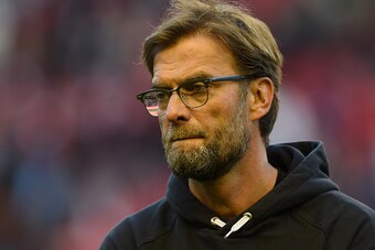 Liverpool's German manager Jurgen Klopp looks on before the English Premier League football match between Liverpool and Everton at Anfield in Liverpool, north west England on April 20, 2016. / AFP / PAUL ELLIS / RESTRICTED TO EDITORIAL USE. No use with un