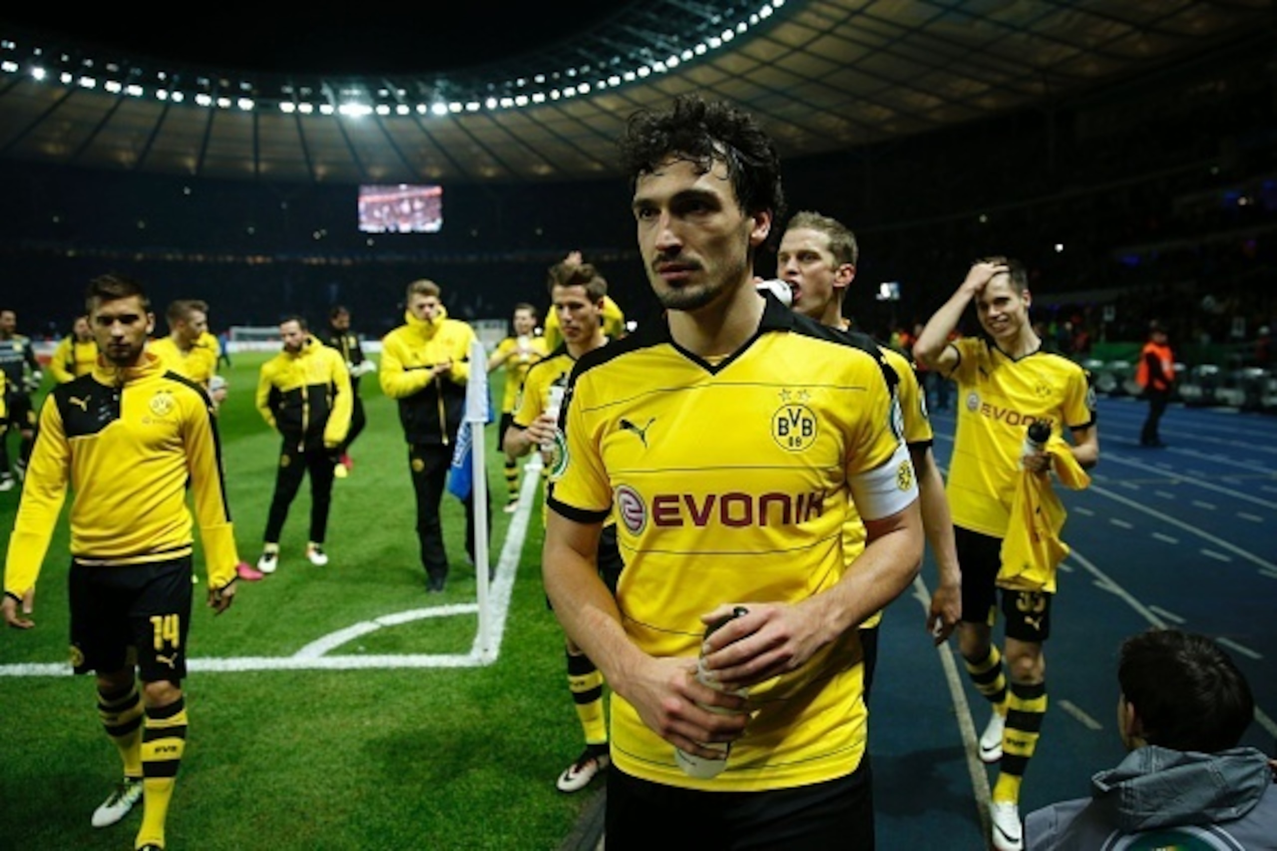 Dortmund's defender Mats Hummels and his team-mates make their way to the fans after the German Cup (DFB Pokal) semi-final football match Hertha Berlin v Borussia Dortmund at the Olympic stadium in Berlin on April 20, 2016.   
Dortmund won the match 0-3 a
