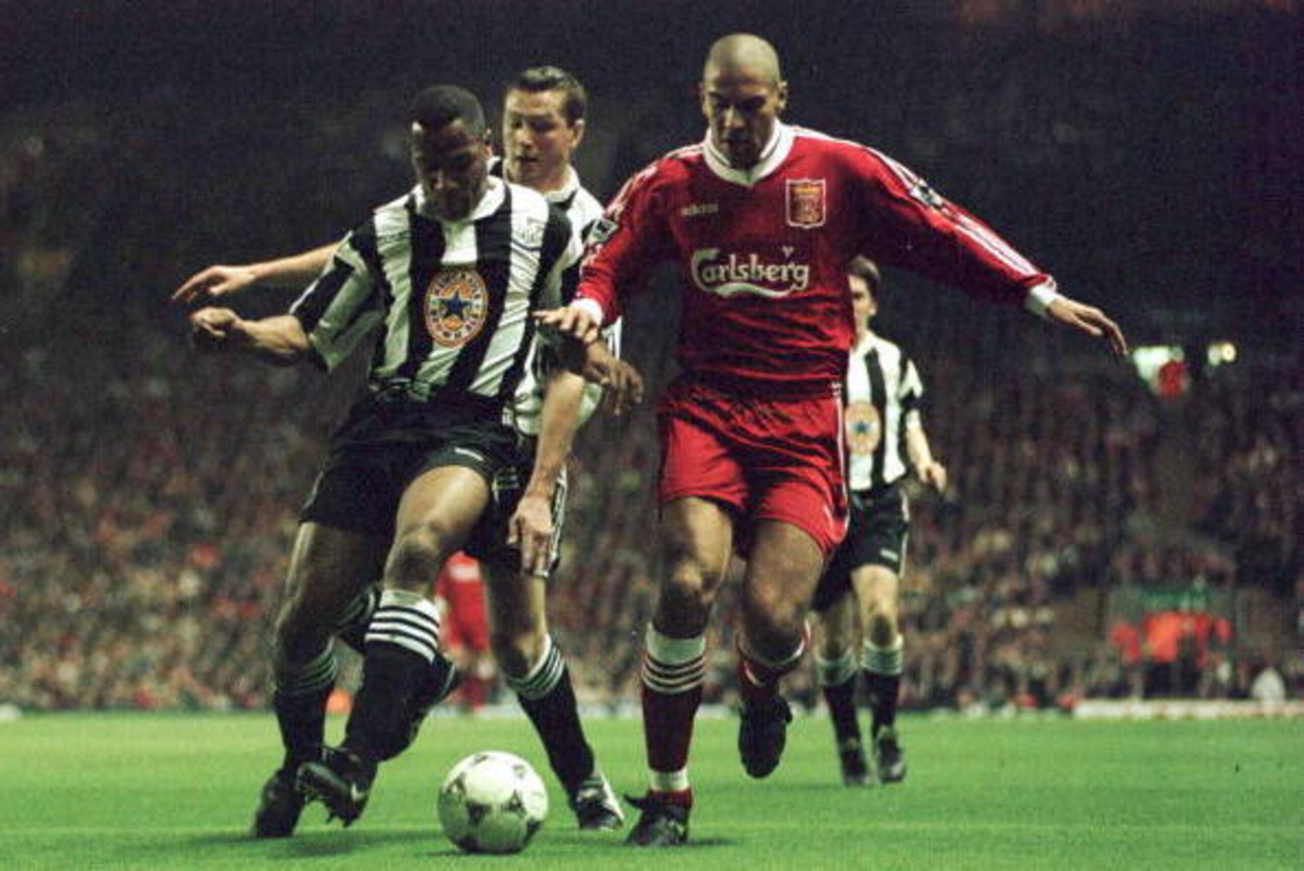 3 Apr 1996:  Stan Collymore of Liverpool battles for the ball with Les Ferdinand of Newcastle United during their FA Premiership game at Anfield, Liverpool. Mandatory Credit: Allsport UK/Allsport