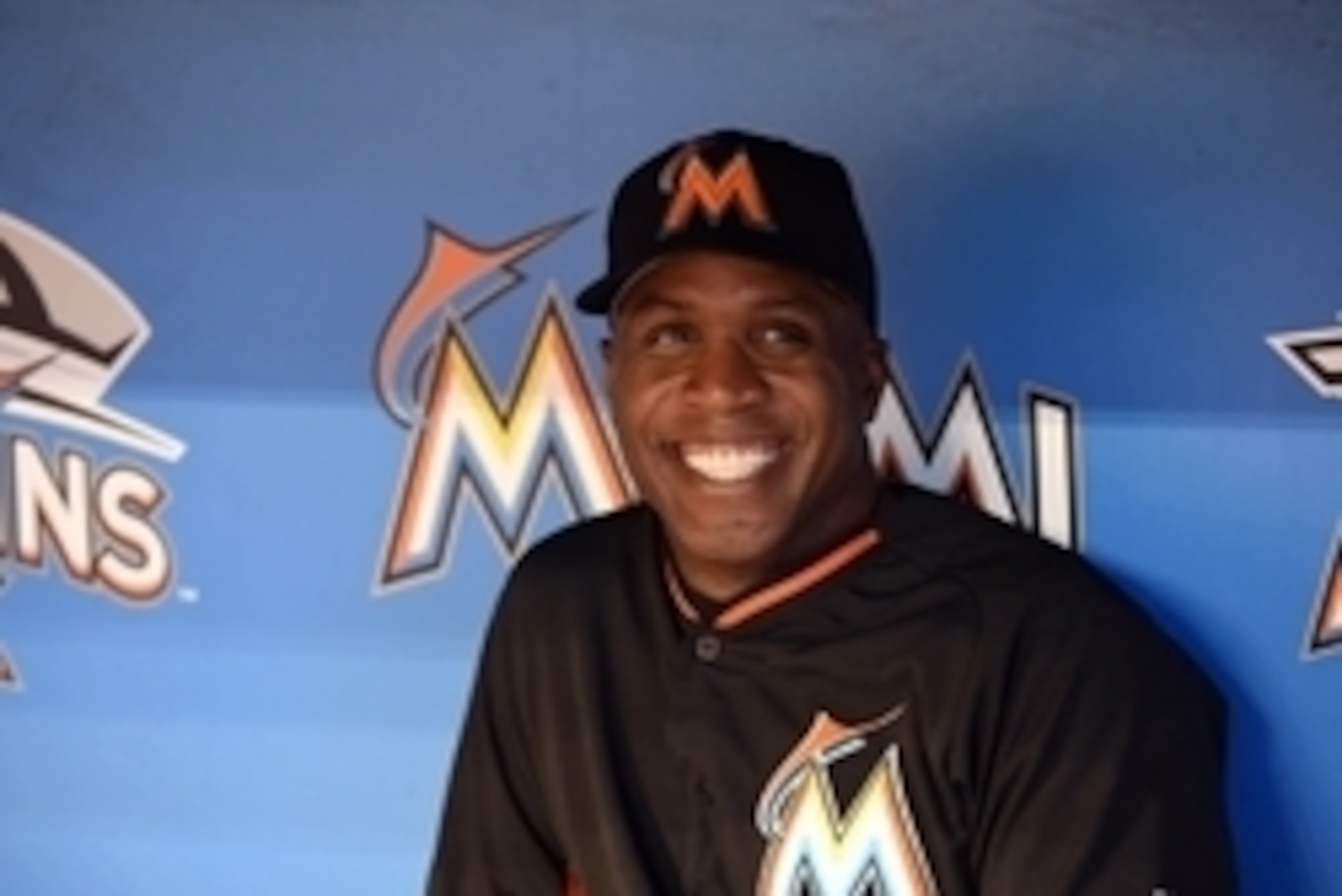 Apr 15, 2016; Miami, FL, USA; Miami Marlins hitting coach Barry Bonds (25) laughs in the dugout before a game against the Atlanta Braves at Marlins Park. Mandatory Credit: Steve Mitchell-USA TODAY Sports