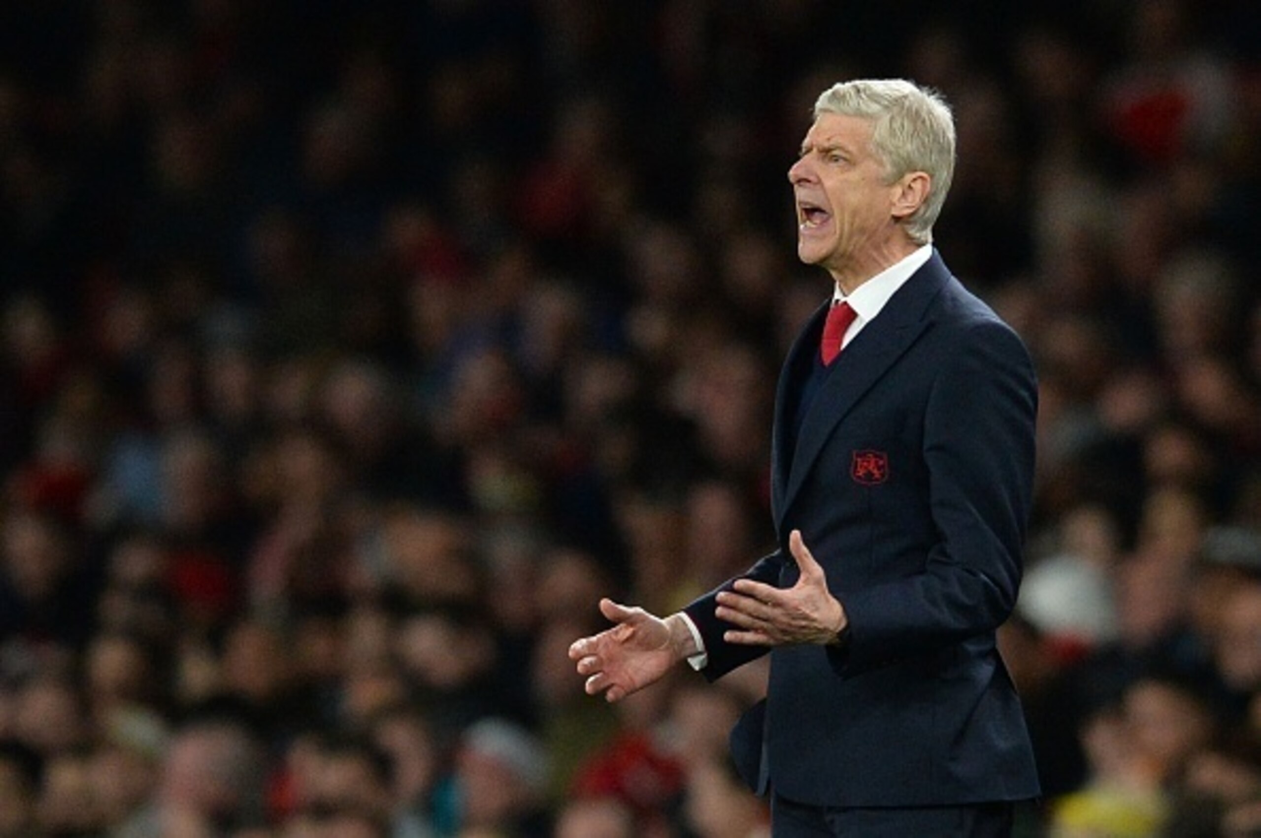 Arsenal's French manager Arsene Wenger reacts on the touchline during the English Premier League football match between Arsenal and West Bromwich Albion at the Emirates Stadium in London on April 21, 2016.  / AFP / GLYN KIRK / RESTRICTED TO EDITORIAL USE.