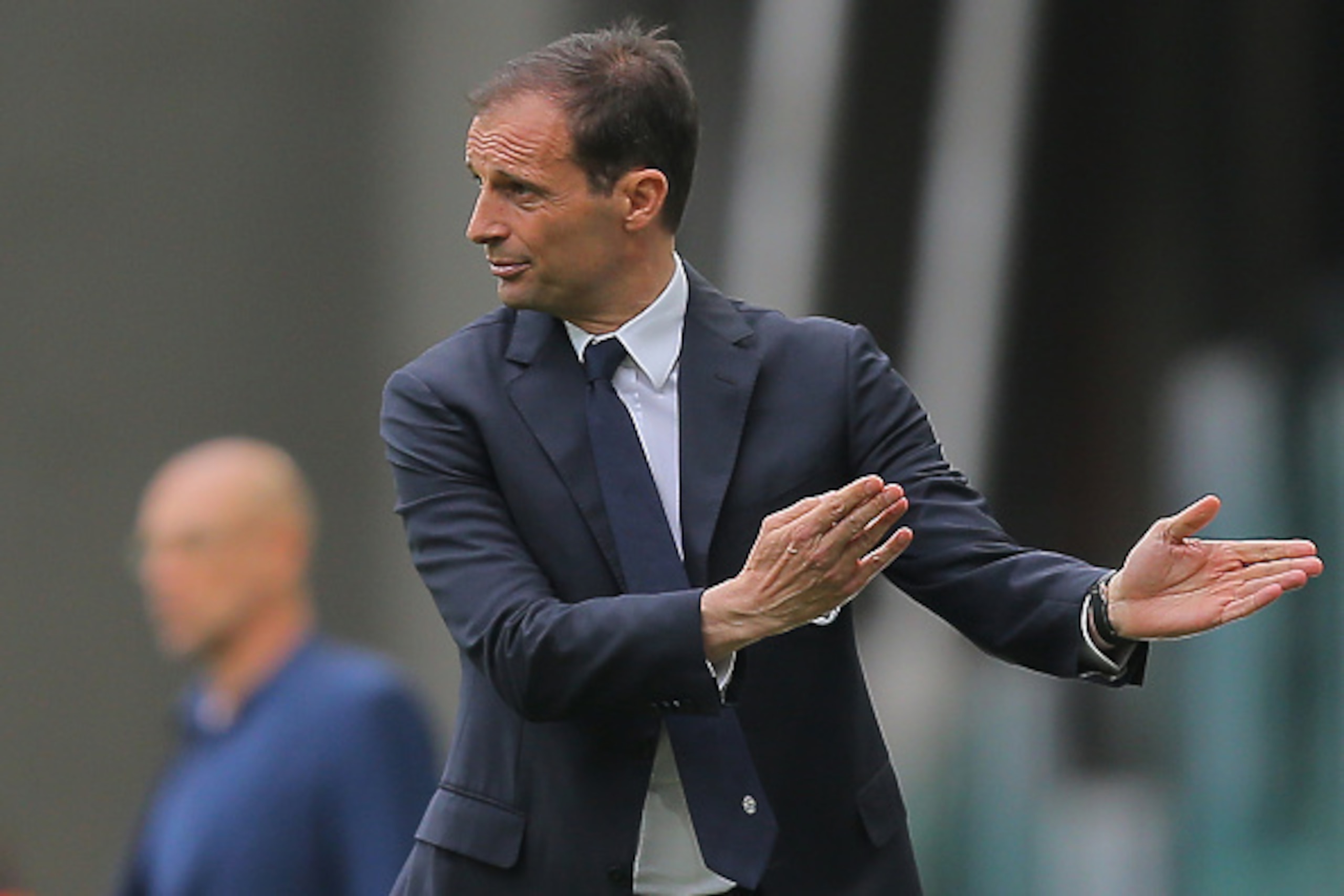 Juventus' coach Massimiliano Allegri gestures during the Italian Serie A football match Juventus vs Palermo on April 17, 2016 at the Juventus stadium in Turin.  / AFP / MARCO BERTORELLO        (Photo credit should read MARCO BERTORELLO/AFP/Getty Images)