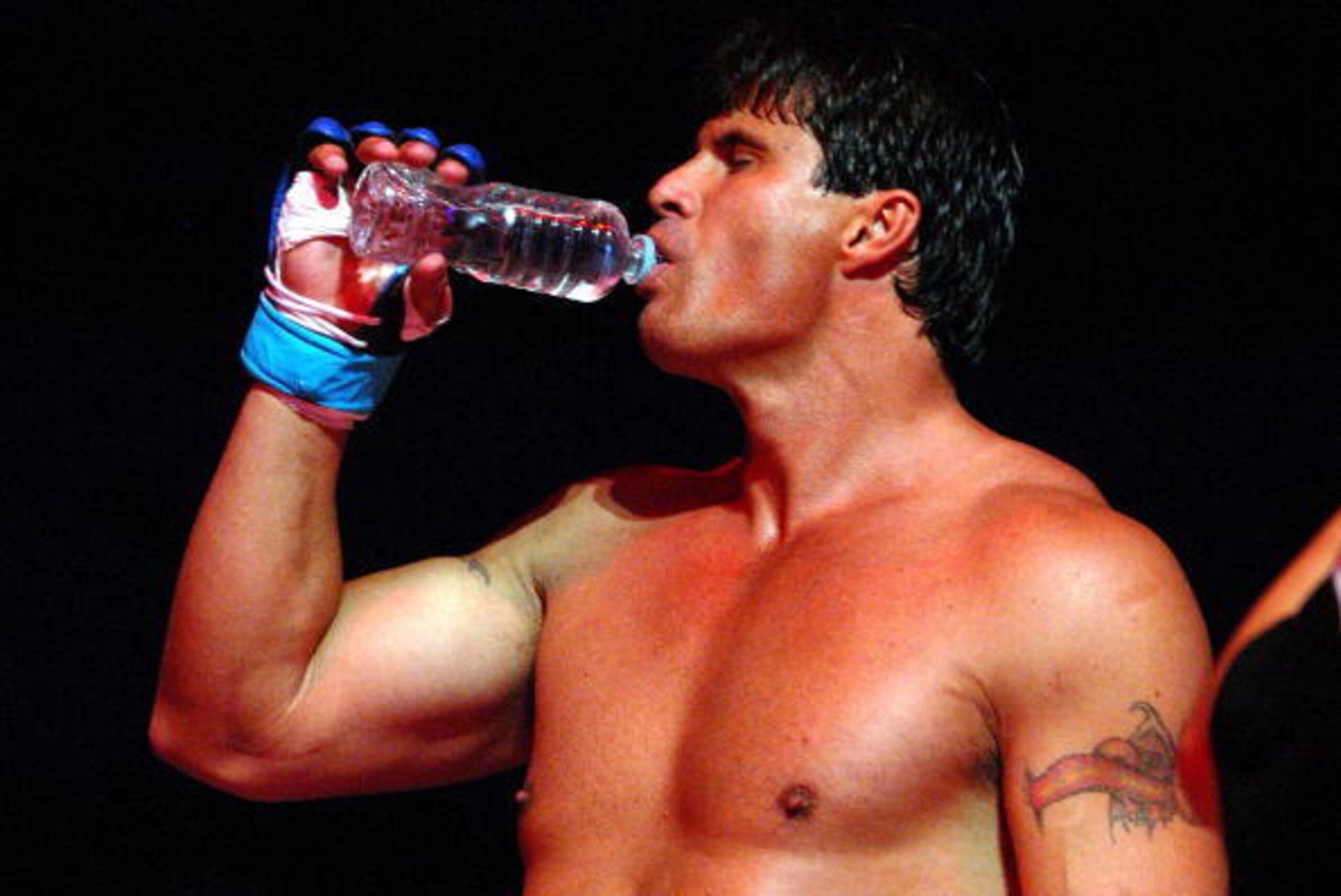 YOKOHAMA, JAPAN - MAY 26: Former Oakland Athletics slugger Jose Canseco drinks a bottle of water prior to the match with Choi Hong-man at first Round of Super Hulk Tournament during Dream.9 at Yokohama Arena on May 26, 2009 in Yokohama, Kanagawa, Japan. YOKOHAMA, JAPAN - MAY 26: Former Oakland Athletics slugger Jose Canseco drinks a bottle of water prior to the match with Choi Hong-man at first Round of Super Hulk Tournament during Dream.9 at Yokohama Arena on May 26, 2009 in Yokohama, Kanagawa, Japan.