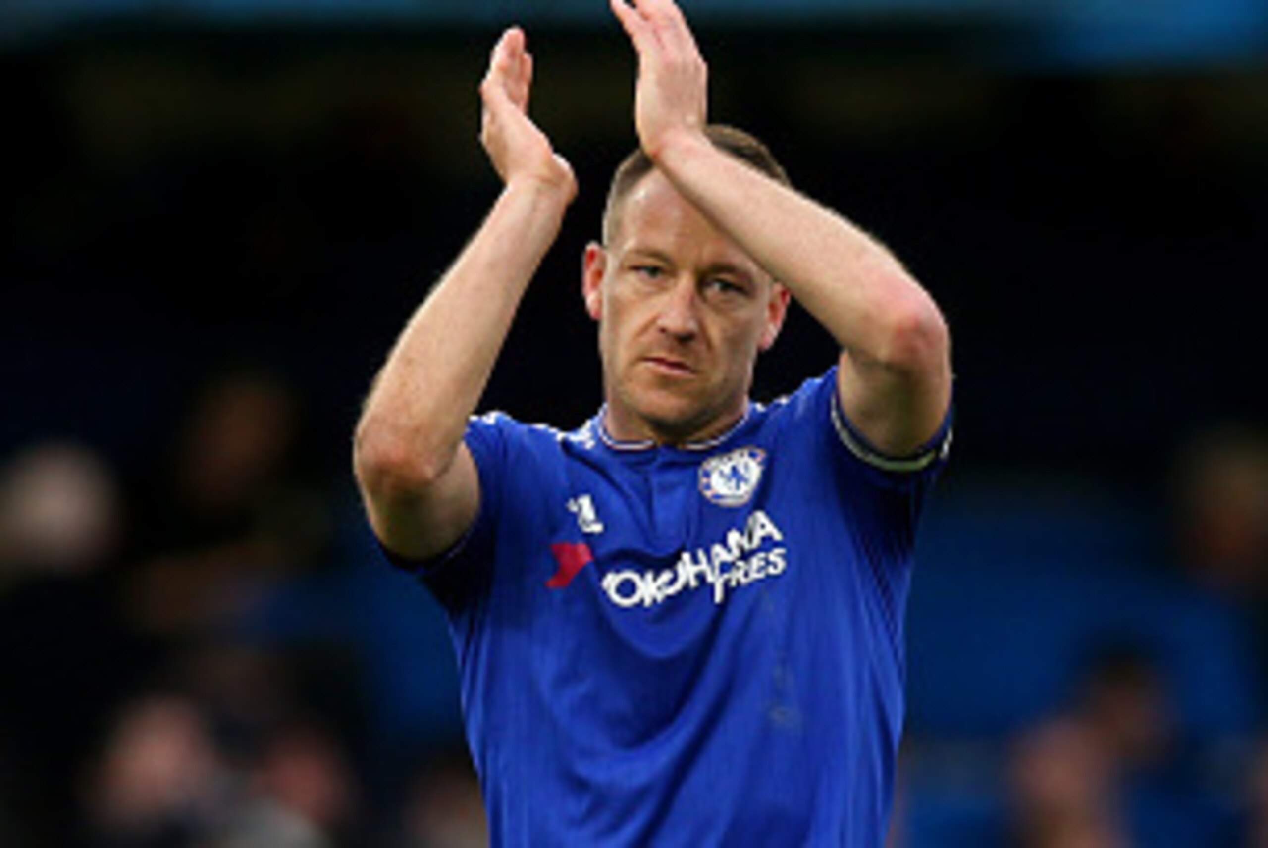 LONDON, ENGLAND - MARCH 19:  John Terry of Chelsea applauds the supporters after his team's 2-2 draw in the Barclays Premier League match between Chelsea and West Ham United at Stamford Bridge on March 19, 2016 in London, United Kingdom.  (Photo by Alex M