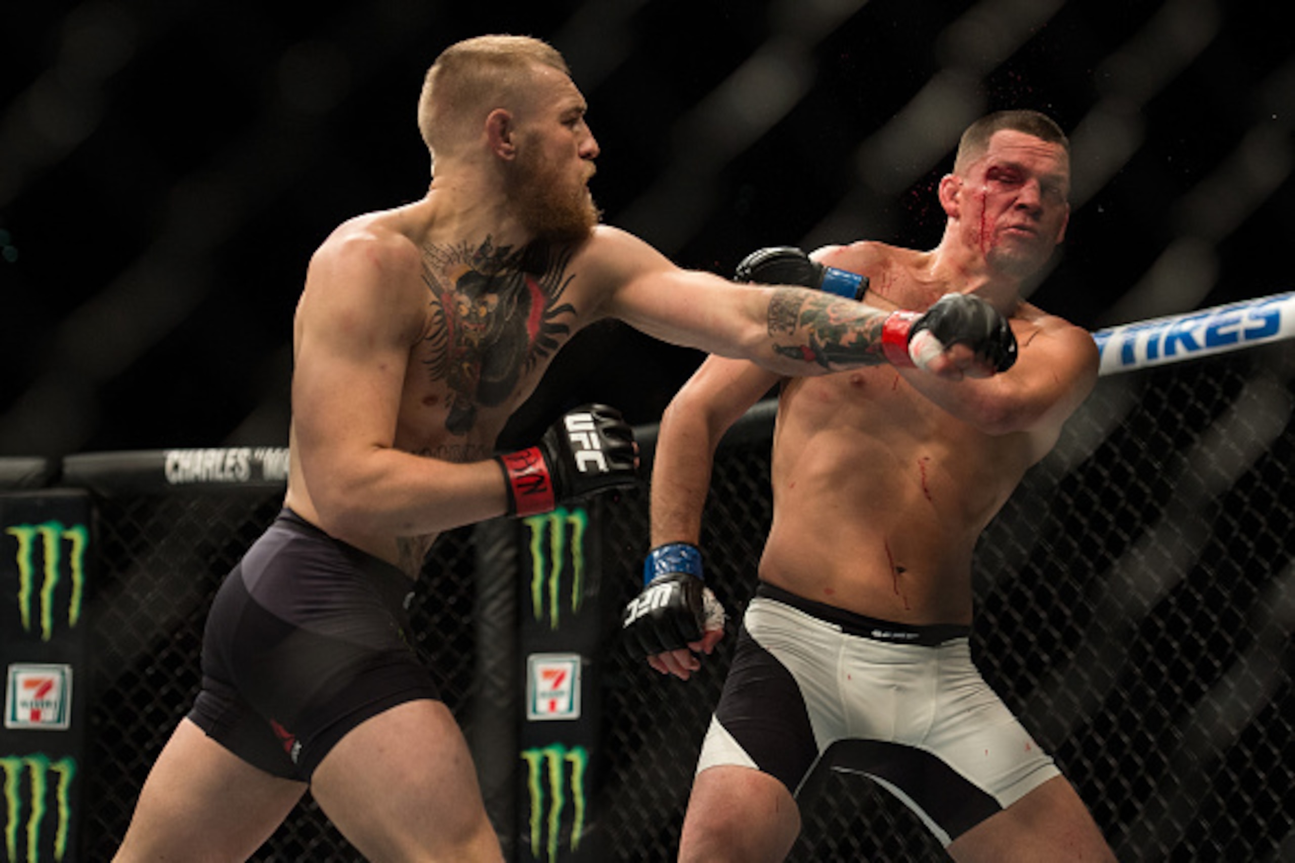 LAS VEGAS, NV - MARCH 5:   (L-R) Conor McGregor punches Nate Diaz in their welterweight bout during the UFC 196 in the MGM Grand Garden Arena on March 5, 2016 in Las Vegas, Nevada. (Photo by Brandon Magnus/Zuffa LLC/Zuffa LLC via Getty Images)