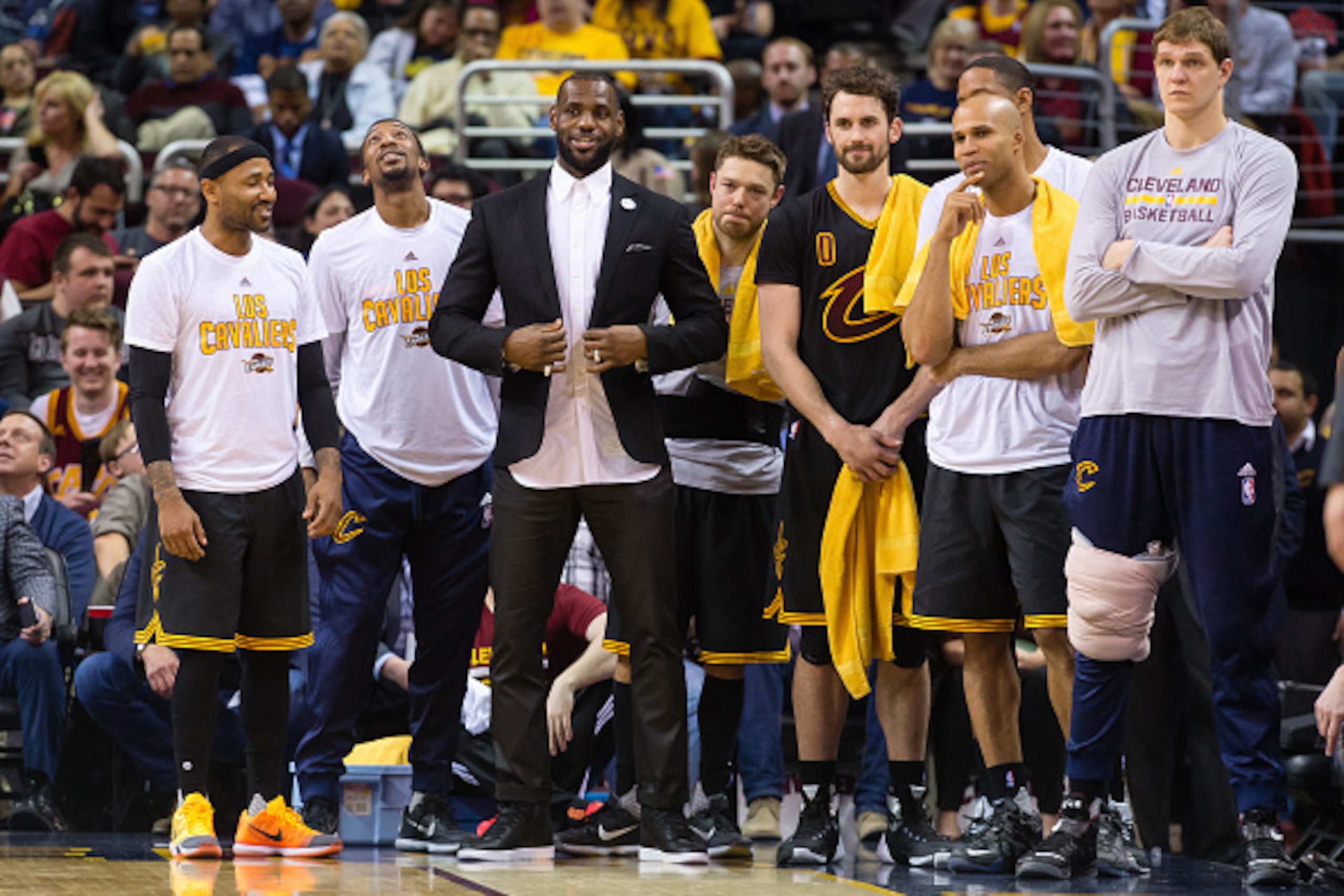 CLEVELAND, OH - MARCH 29: LeBron James #23 of the Cleveland Cavaliers watches with his teammates from the bench during the first half against the Houston Rockets at Quicken Loans Arena on March 29, 2016 in Cleveland, Ohio. NOTE TO USER: User expressly ack