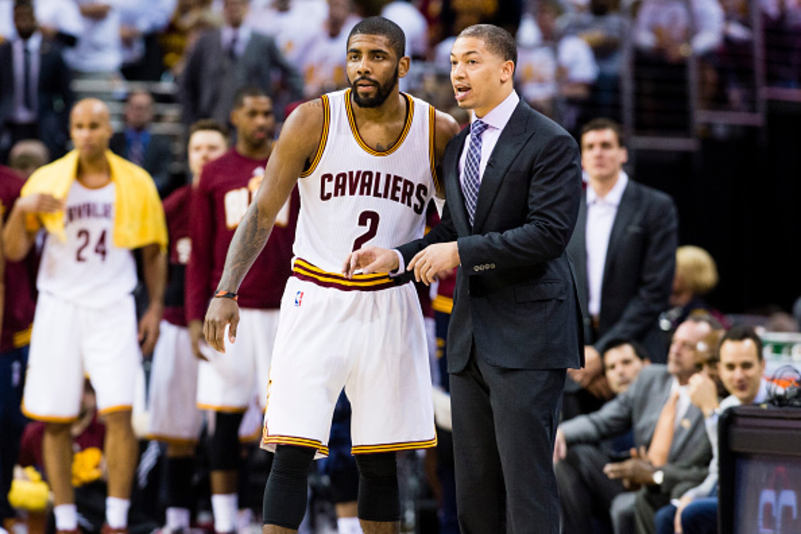 CLEVELAND, OH - APRIL 17: Kyrie Irving #2 of the Cleveland Cavaliers talks to head coach Tyronn Lue during the second half of the NBA Eastern Conference quarterfinals against the Detroit Pistons at Quicken Loans Arena on April 17, 2016 in Cleveland, Ohio.