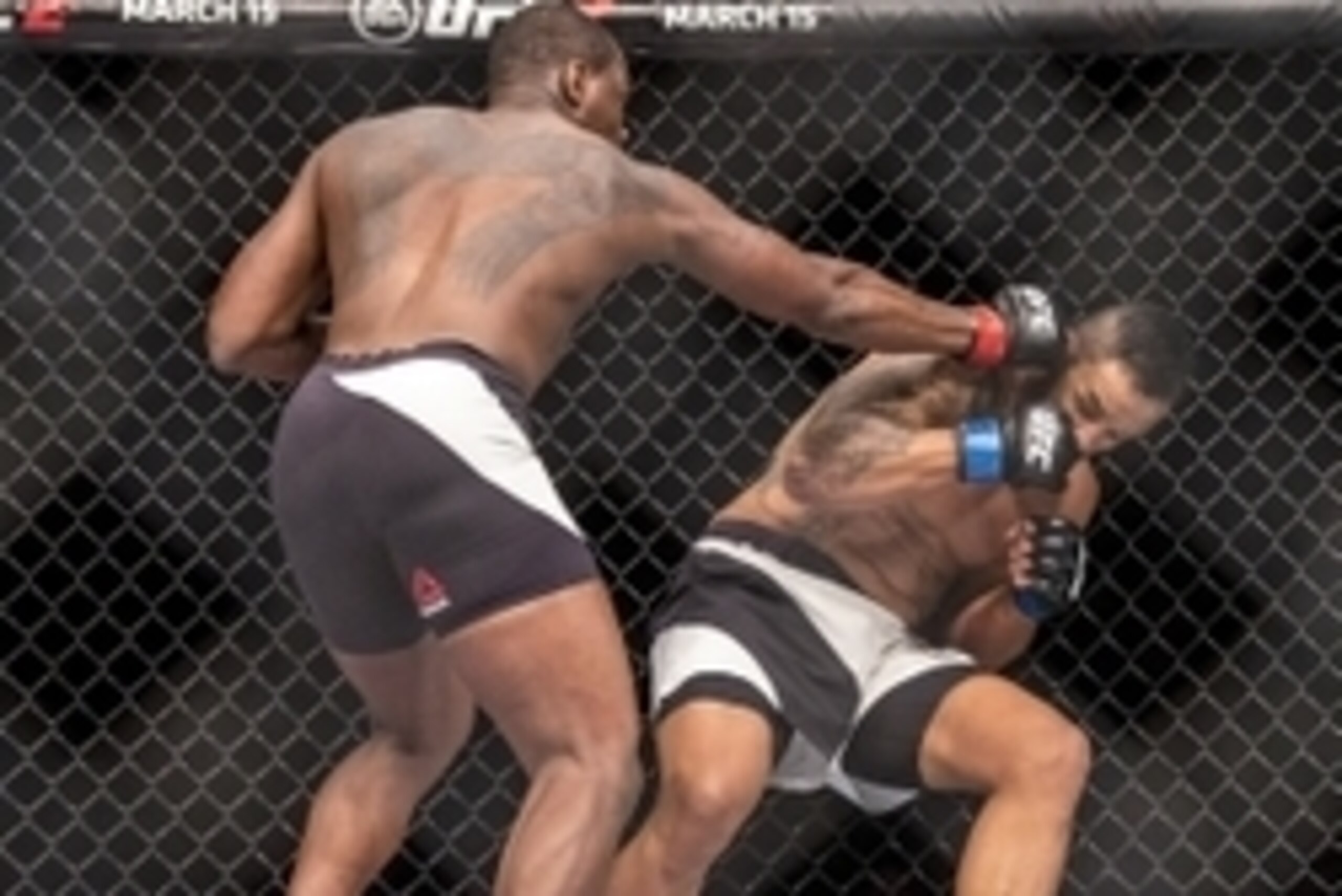Feb 6, 2016; Las Vegas, NV, USA; Ovince Saint Preux (red gloves) fights against Rafael Cavalcante (blue gloves) during UFC Fight Night at MGM Grand Garden Arena. Mandatory Credit: Joshua Dahl-USA TODAY Sports